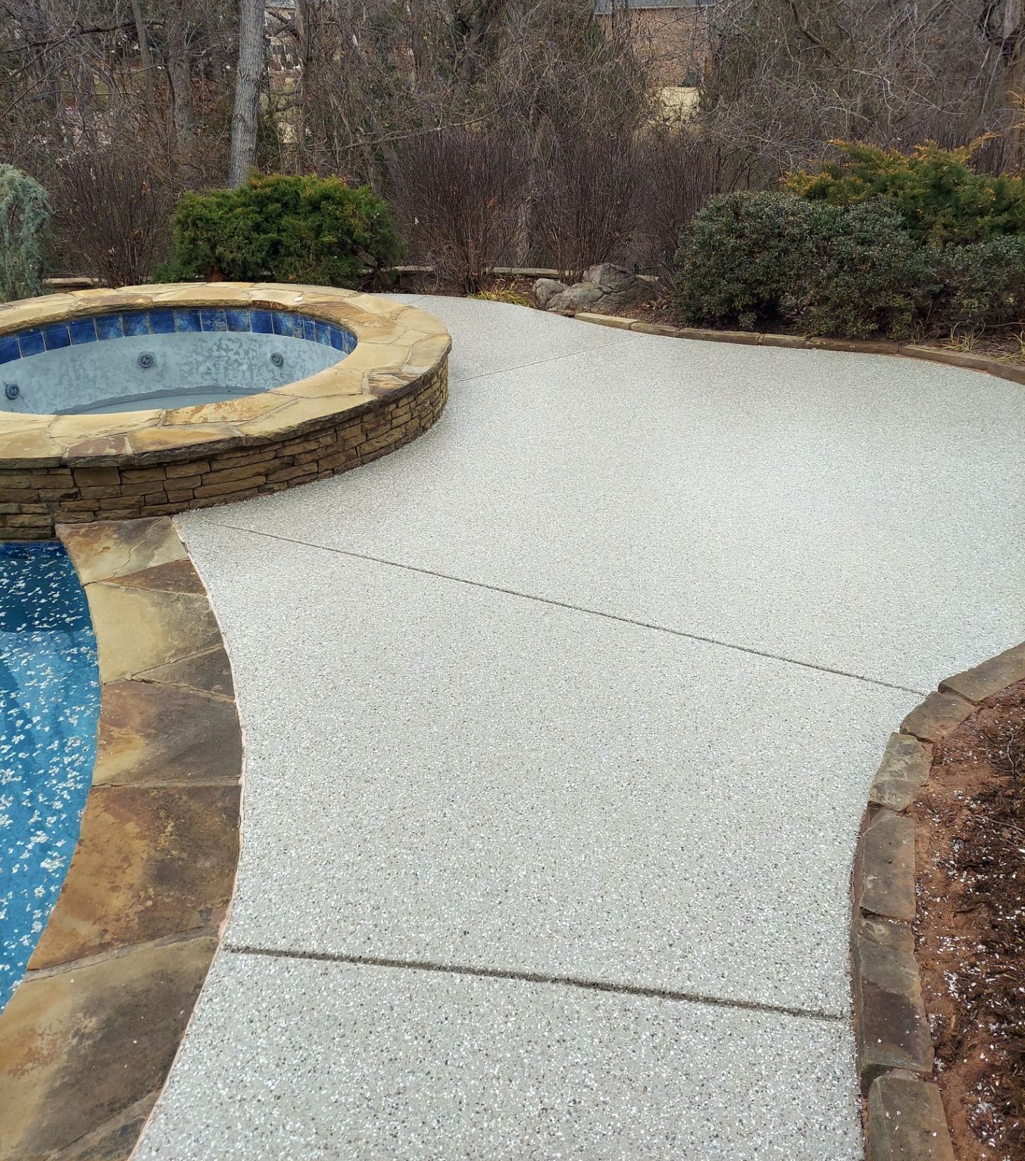 Pool Deck Install with Pebble Beach by Copperhead Coatings