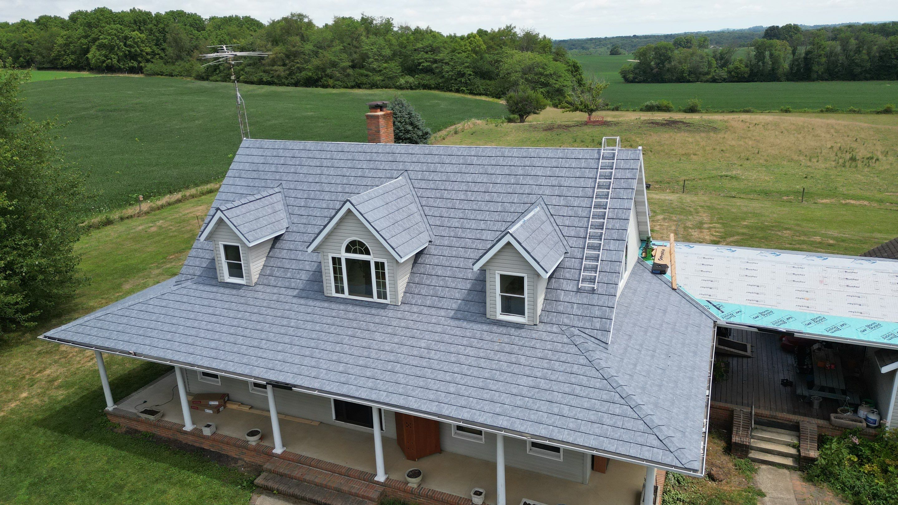 Residential Roofing Installation using ProVia Ironstone Slate Metal Roofing by RoofX 