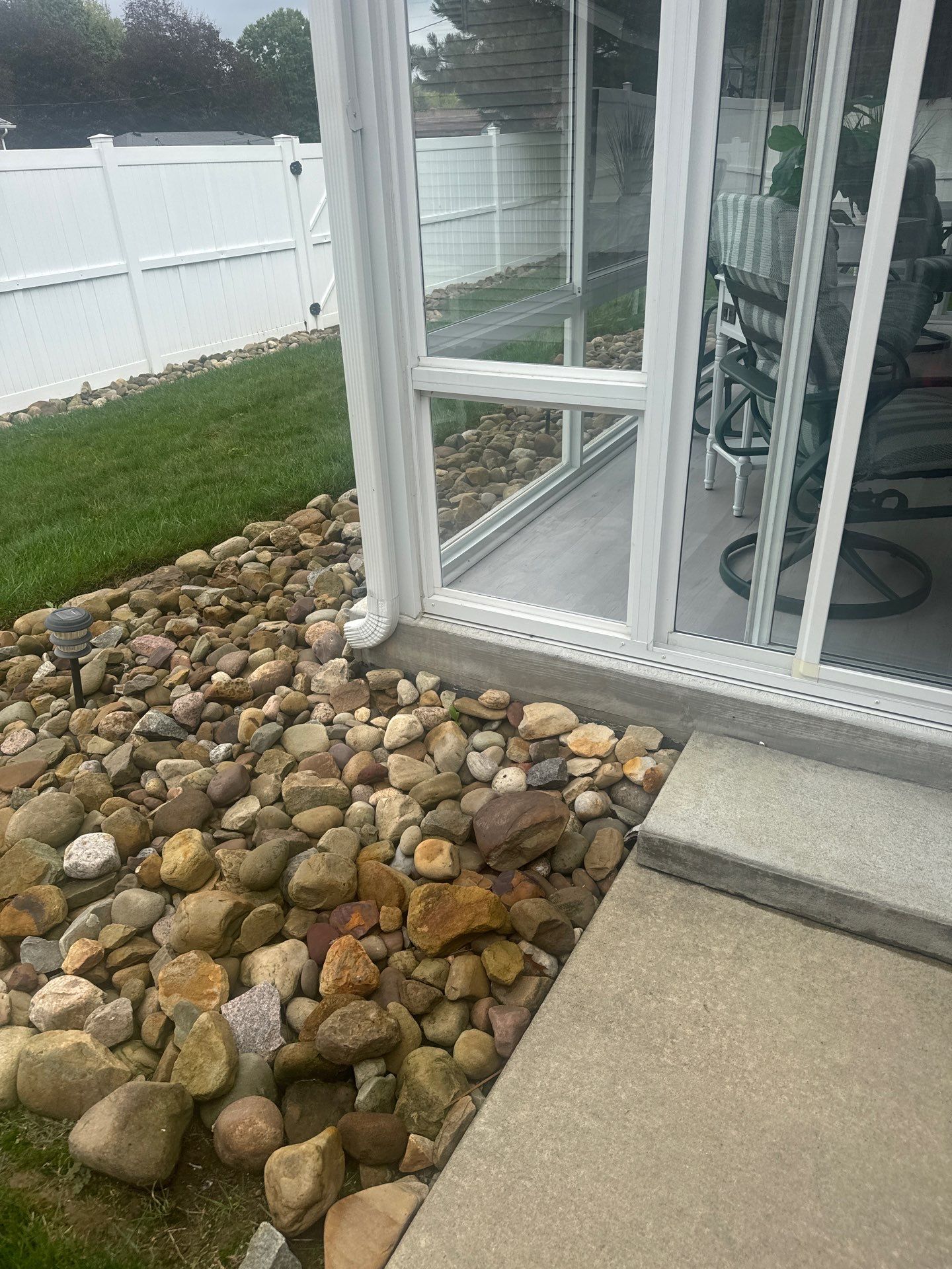 Garage + Sunroom Project in Follansbee by Floors in a Day, Inc