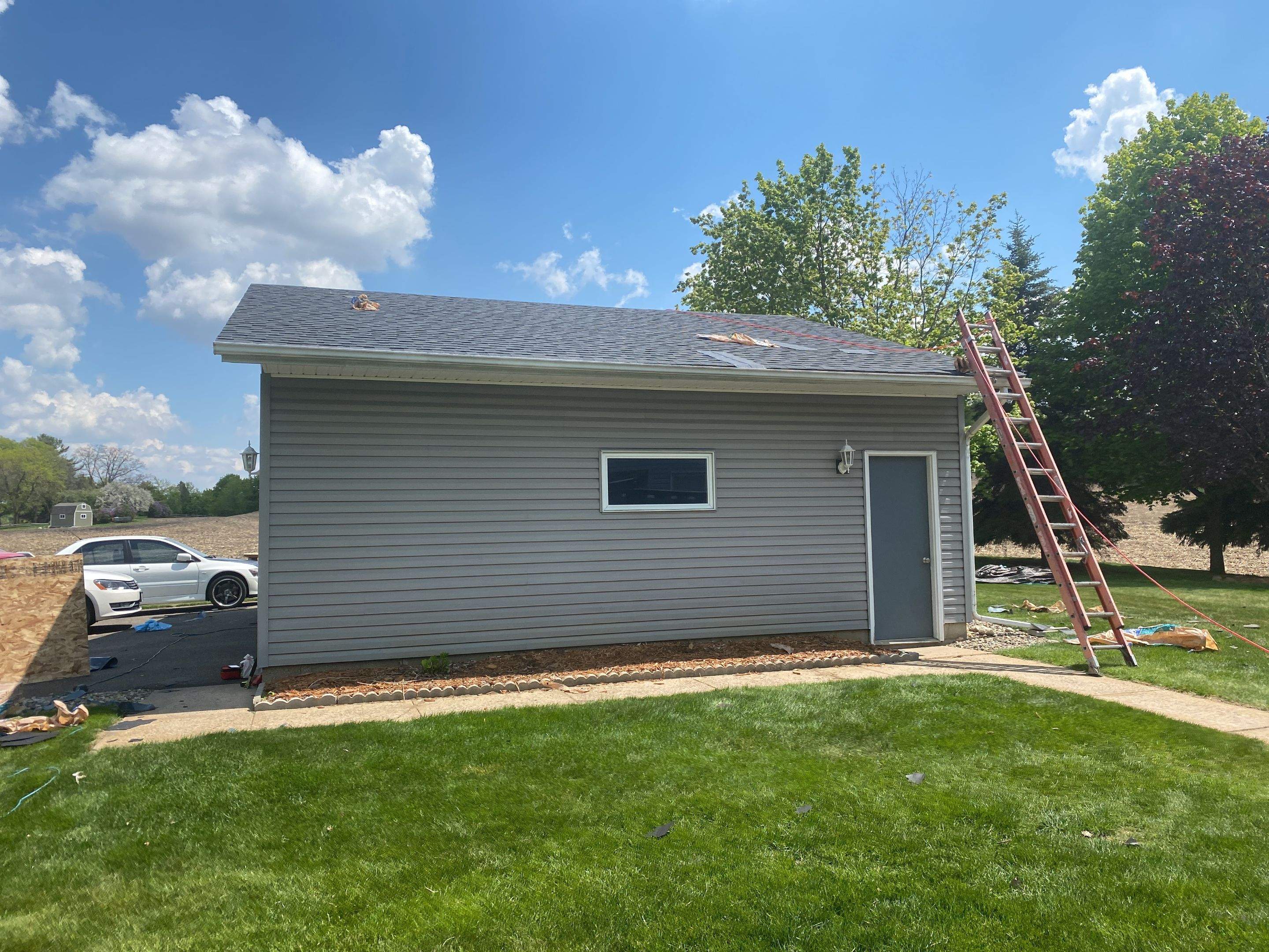 Residential Roofing Installation using Certainteed Landmark Moire Black by MODERN EXTERIOR SYSTEMS