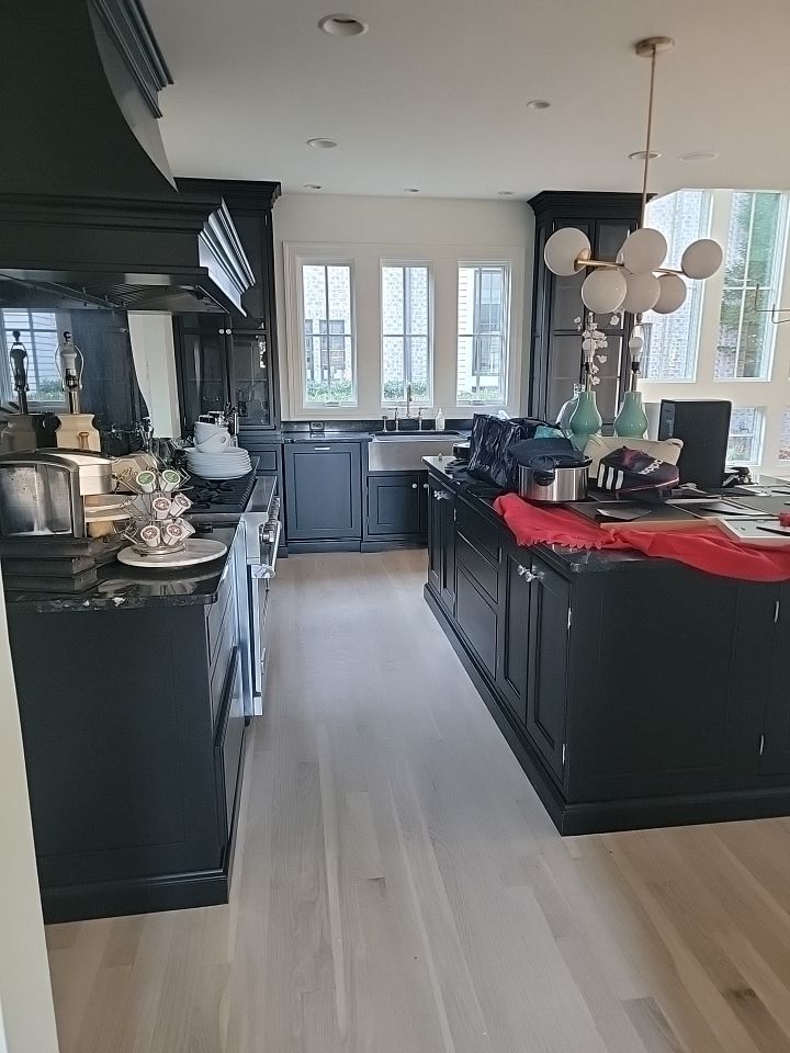 From dark to light, the results are stunning! Beautiful white oak refinish with Country White stain by Footprints Floors of Nashville