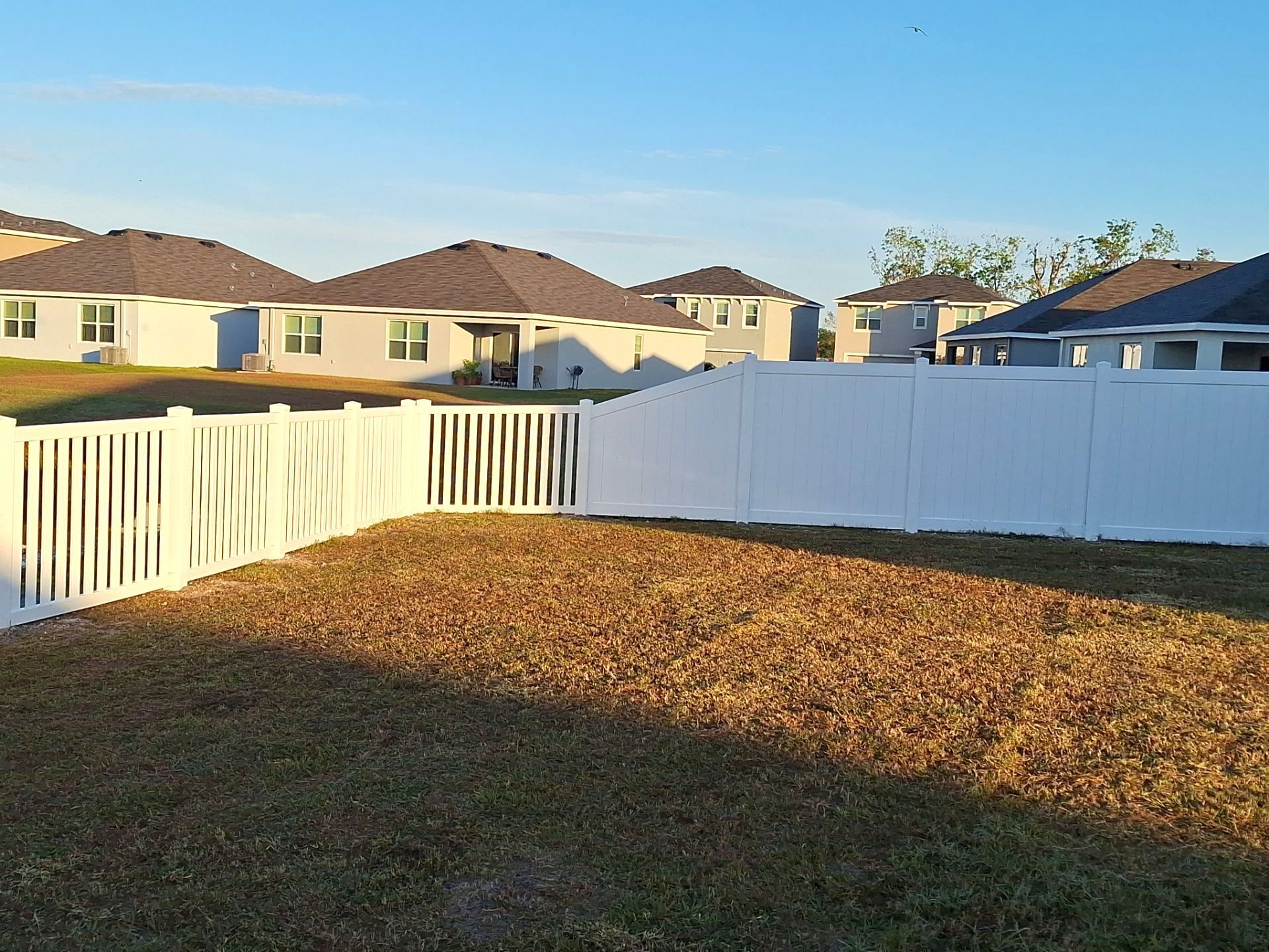 Vinyl Fence Installation using 6Ft White Vinyl Privacy Fence with a 4Ft White Clearwater Picket Fence by Asap fence and gates, LLC