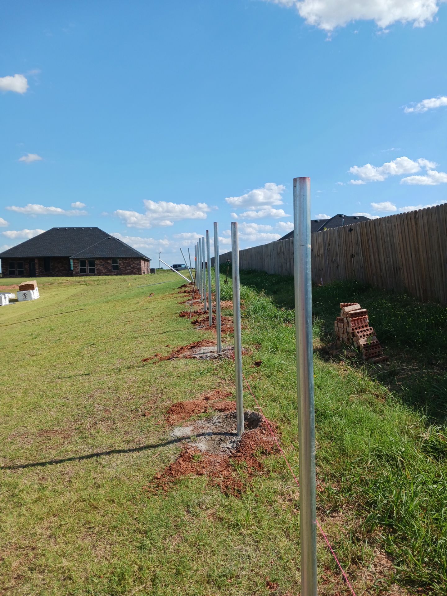 Cedar Fence using Metal Poles by Clays Services Inc