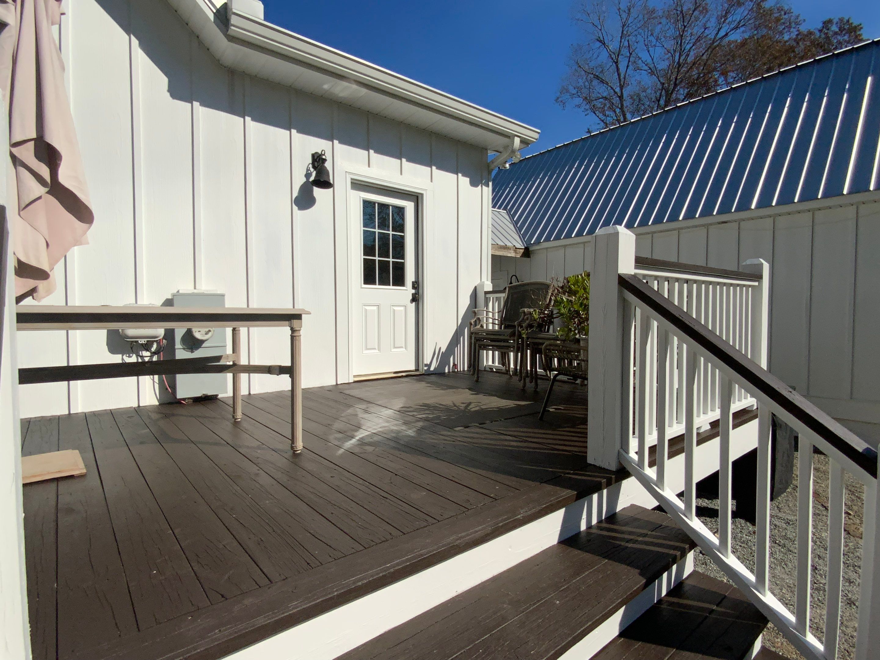 Exterior Trim Painting and Dark Deck Staining in Acworth by Swift Home Renovations
