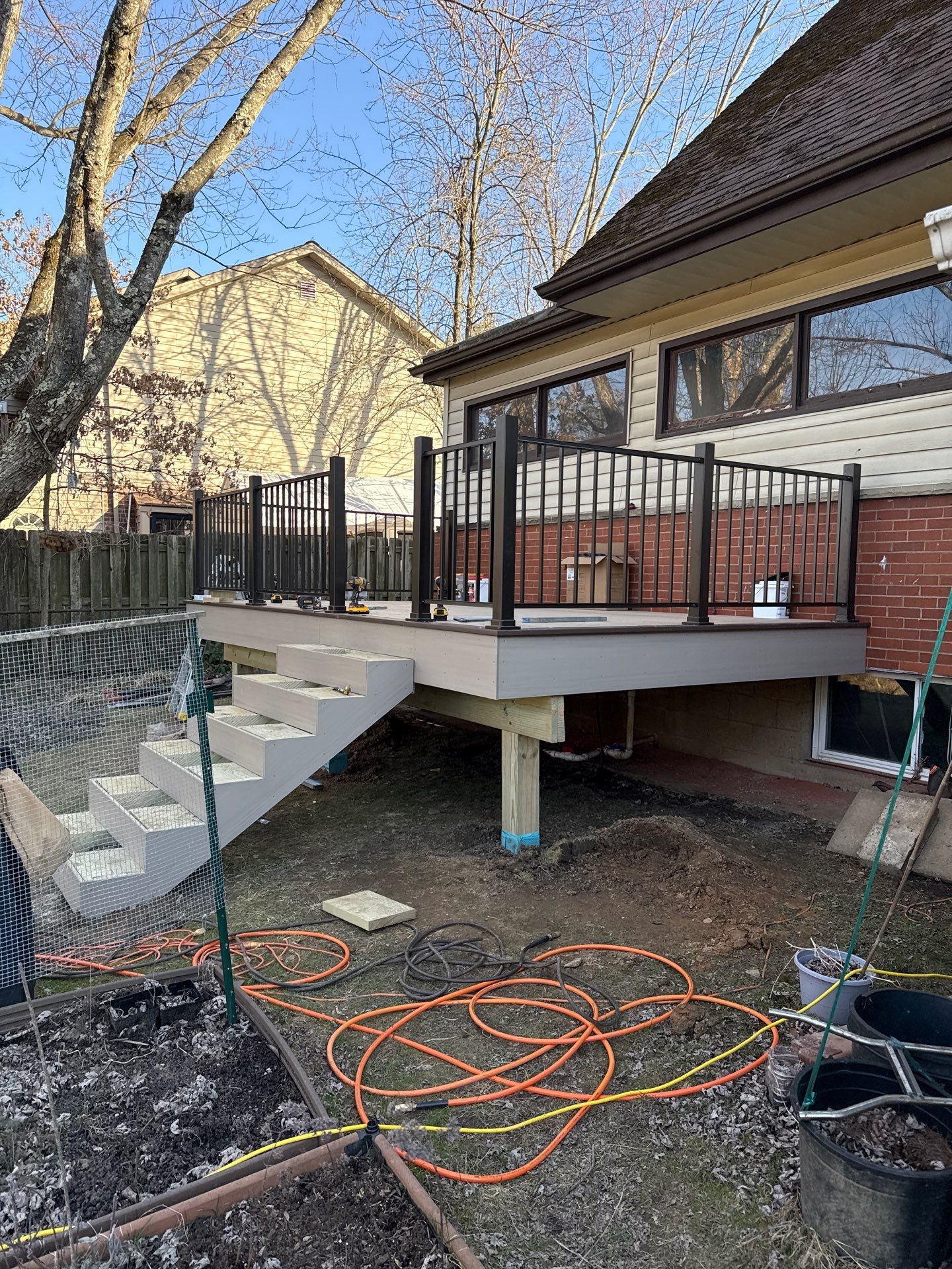 Deck and door install by Cousins Roofing Siding & Decks