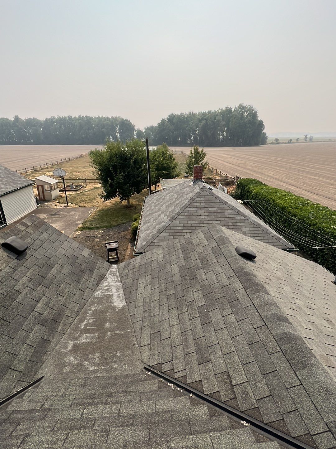 Residential Roofing Installation using IKO Dynasty (Color: Granite Black) by Orezona Building & Roofing Company, Inc.