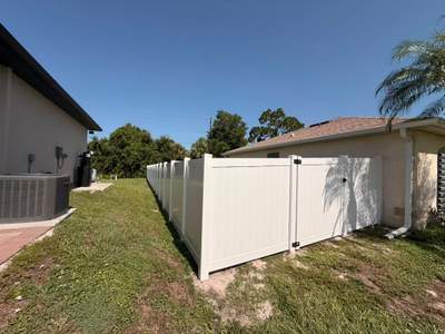 White Vinyl Privacy Fence Repair and Replacement in North Port