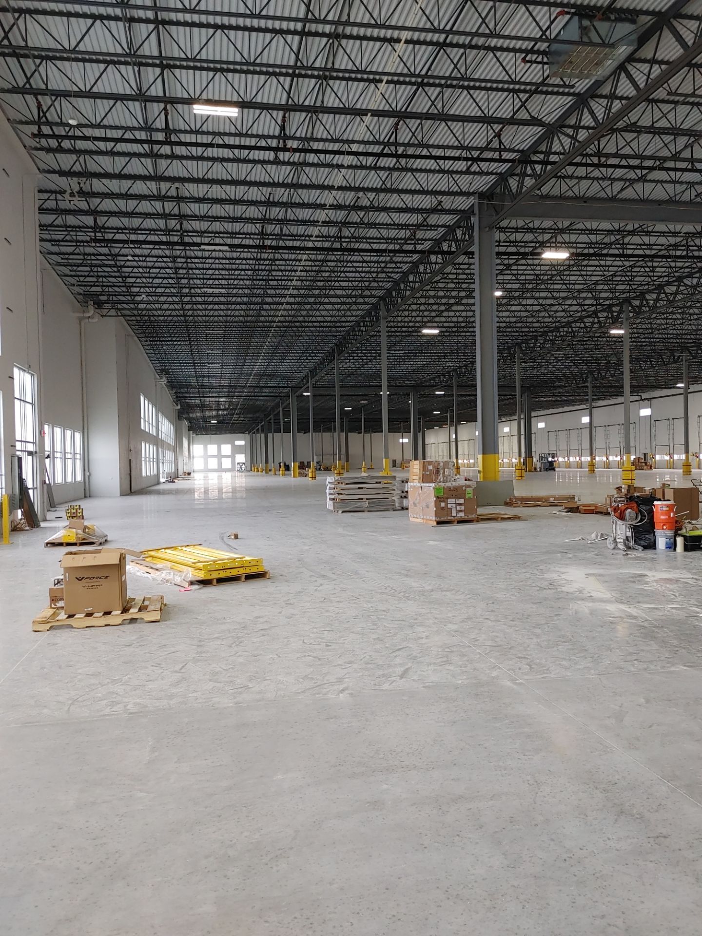 Warehouse Construction using Hallman Lindsay Vertical Concrete Stain 167 by Blair Commercial Painting, LLC