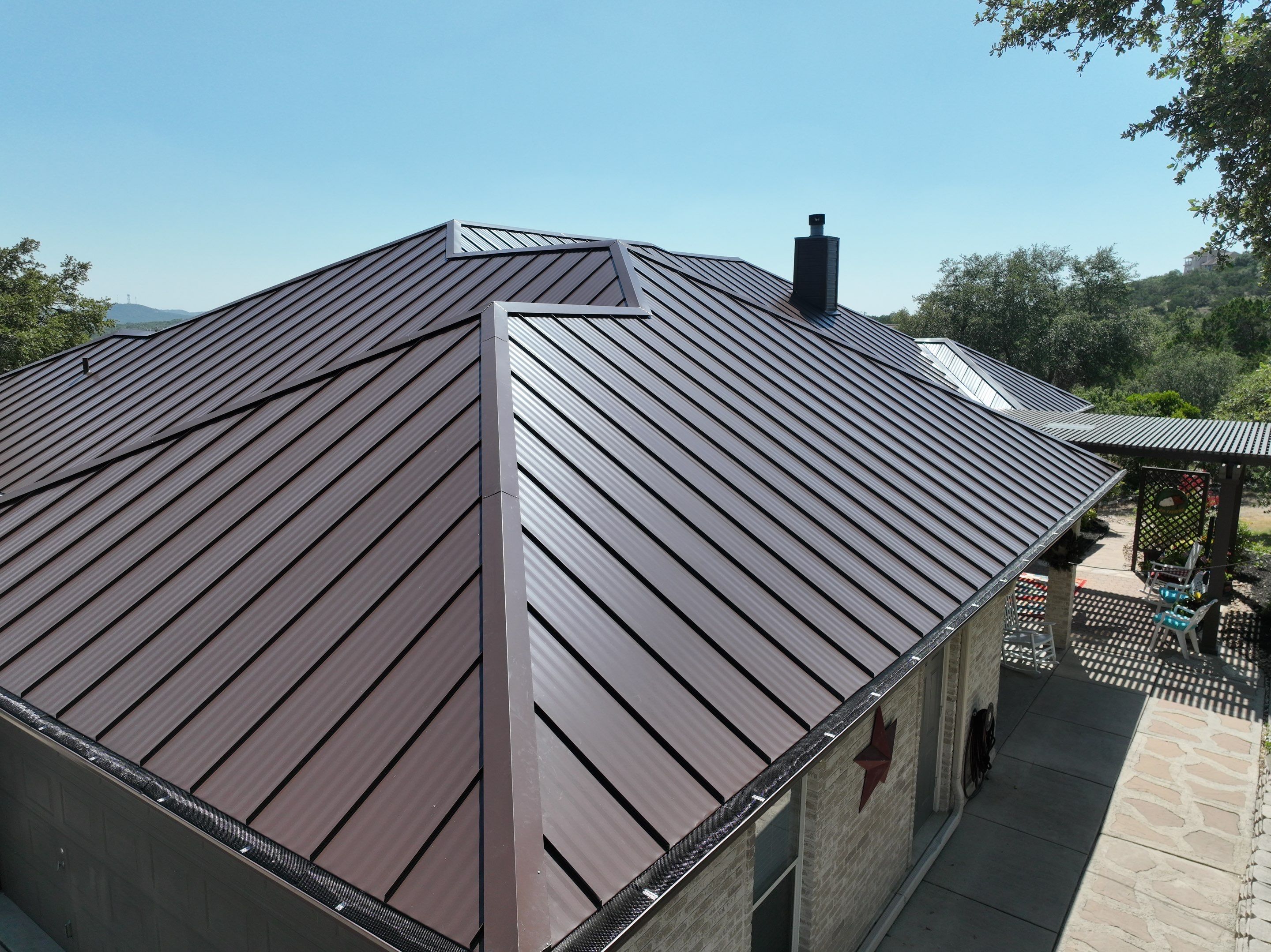 Residential Metal Roof Installation using McElroy Metal by Premier Roofing and Contracting