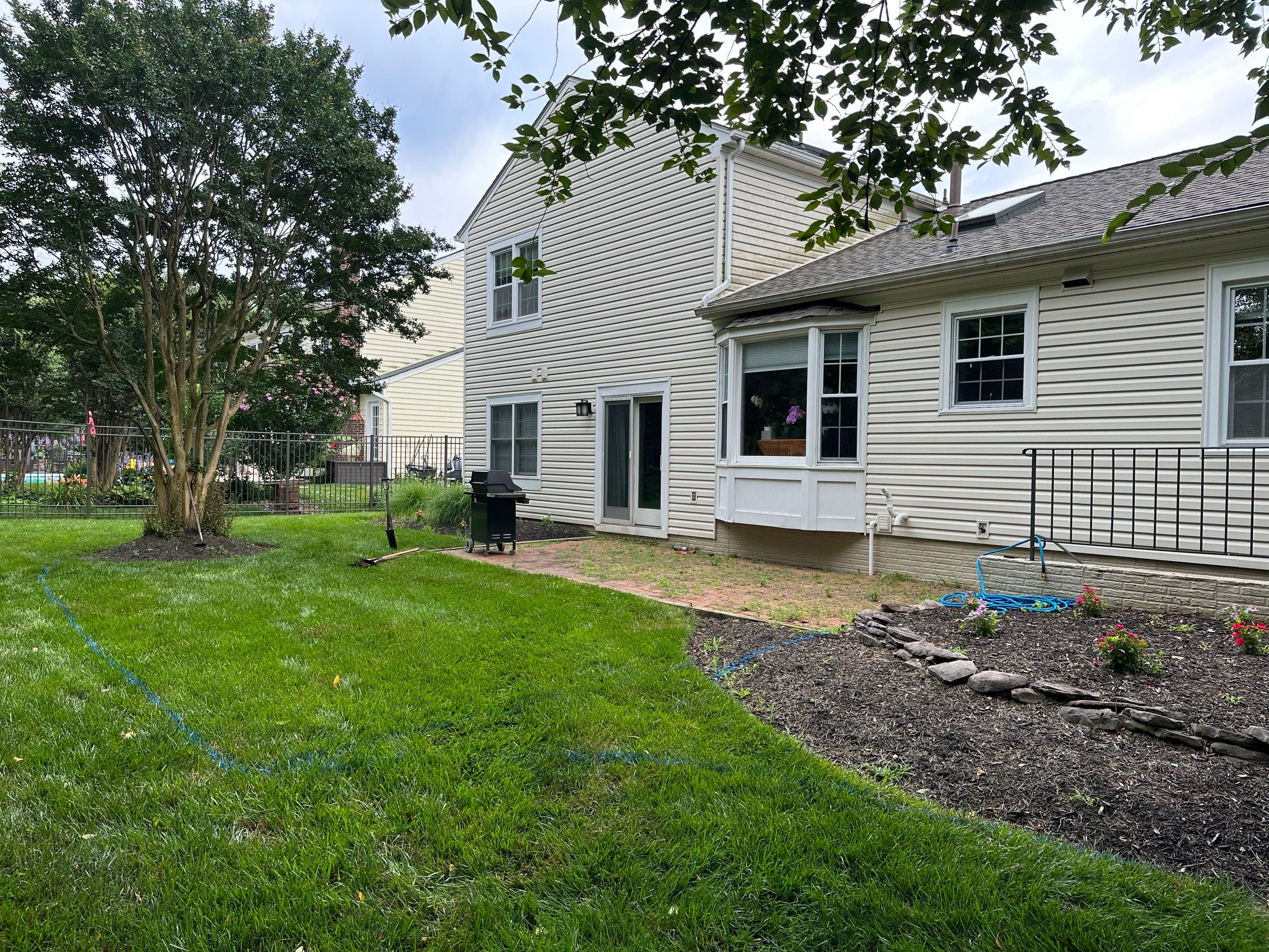 Backyard Transformation using Techo-Bloc Pavers by The Smet Companies, LLC