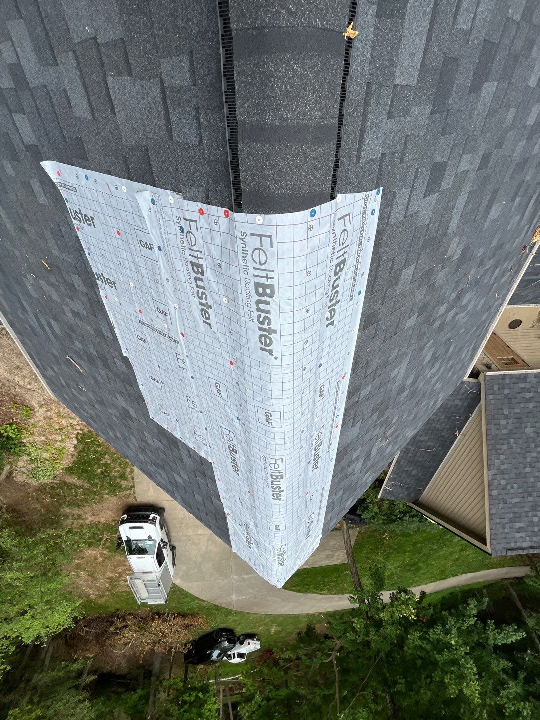 Residential Roofing Installation using Duration Series Shingles - Onyx Black by RoofX 