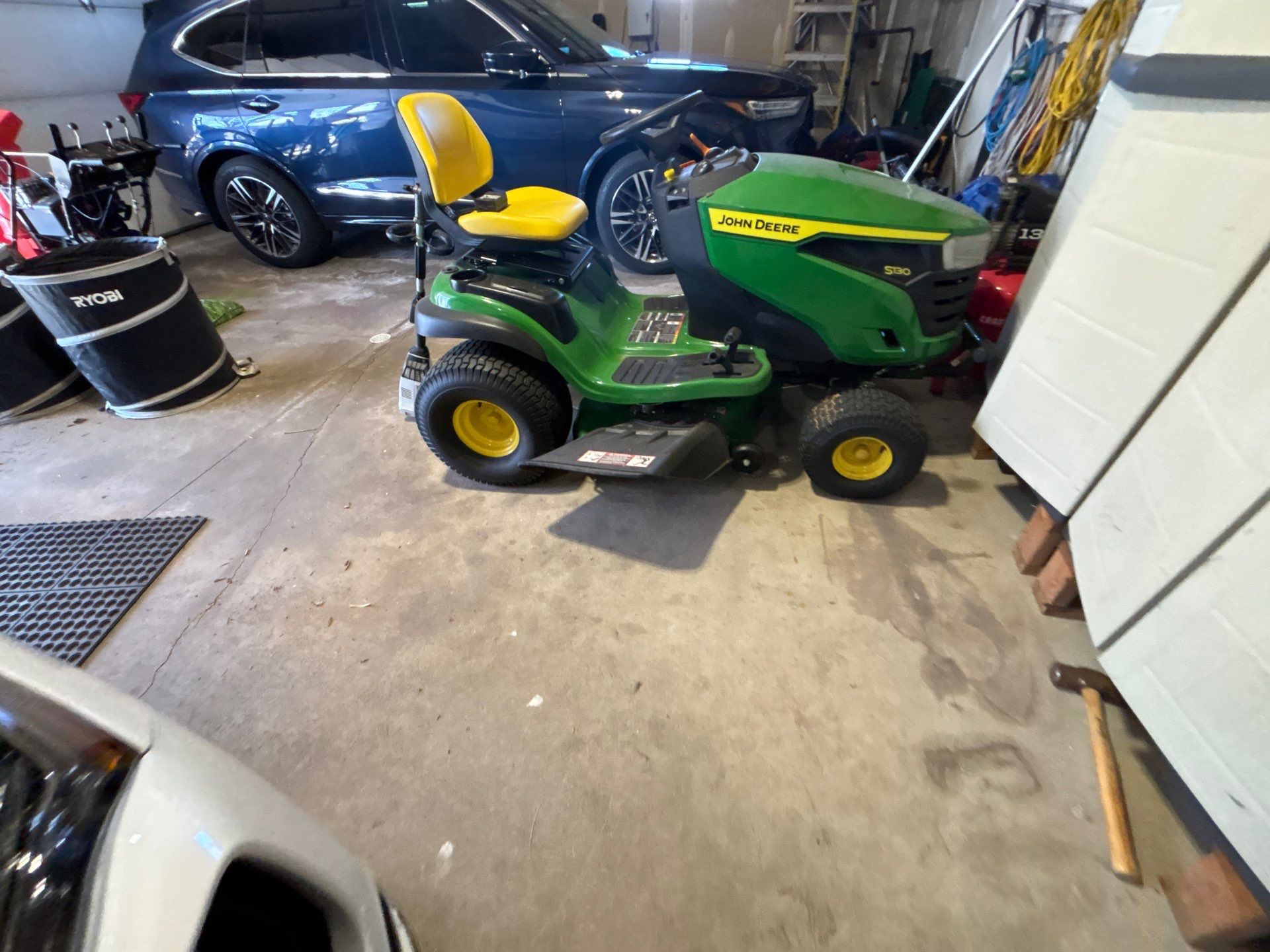 Sioux Falls Garage Concrete Repair and Epoxy Flake Floor Coating by Select Painting, Coatings & Garage Cabinets