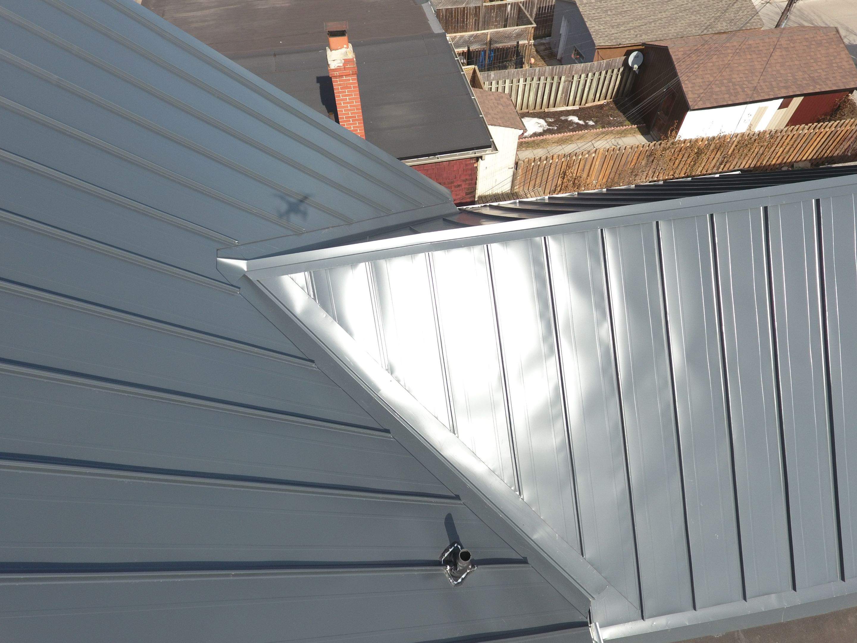 Standing Seam Metal Roofing using 16" Standing Seam Panels by Jay Carter Roofing & Sheet Metal