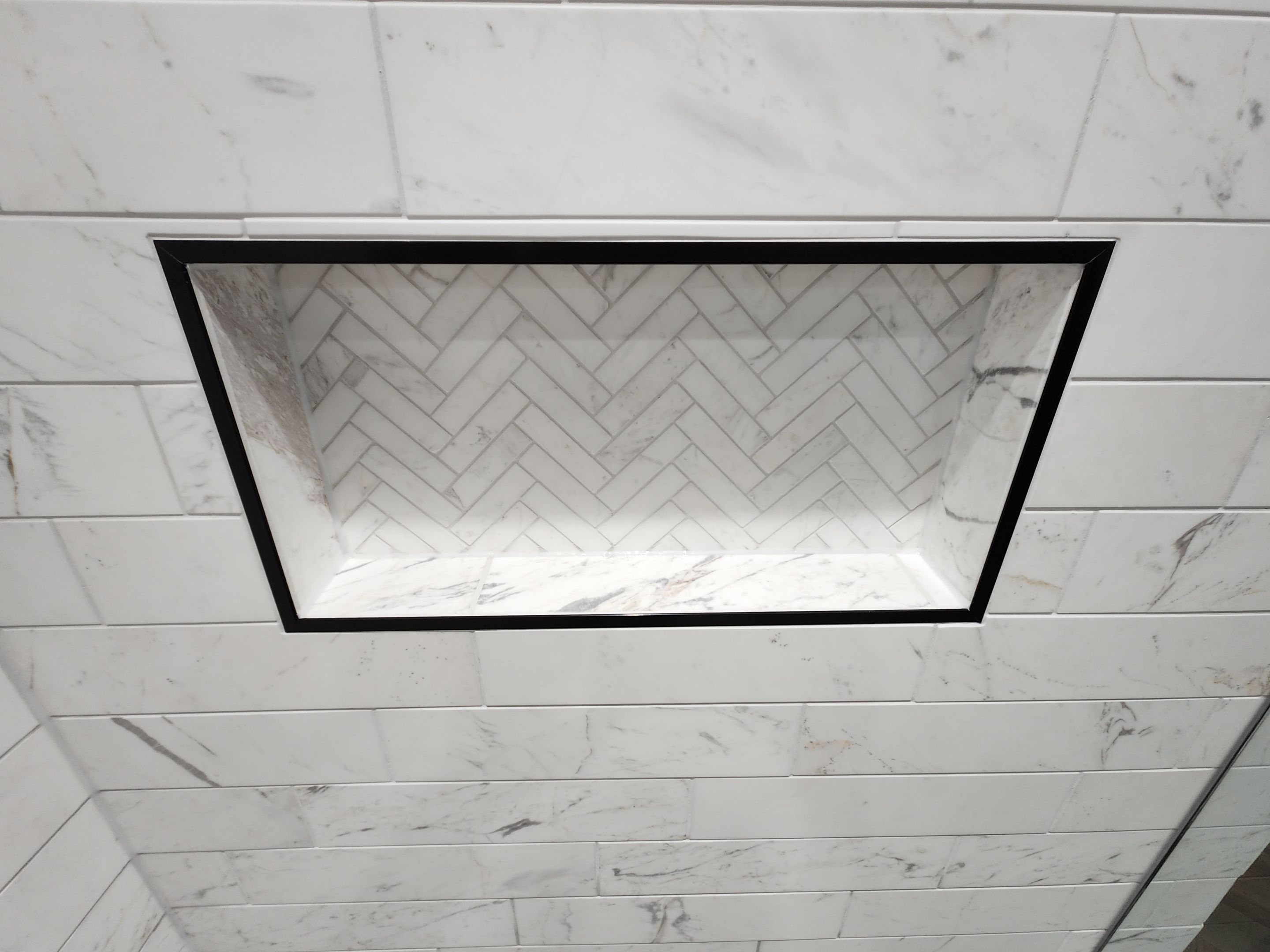Spring Bathroom Remodel with Black Free-Standing Tub and Walk-In Shower by Legacy Bath and Kitchen