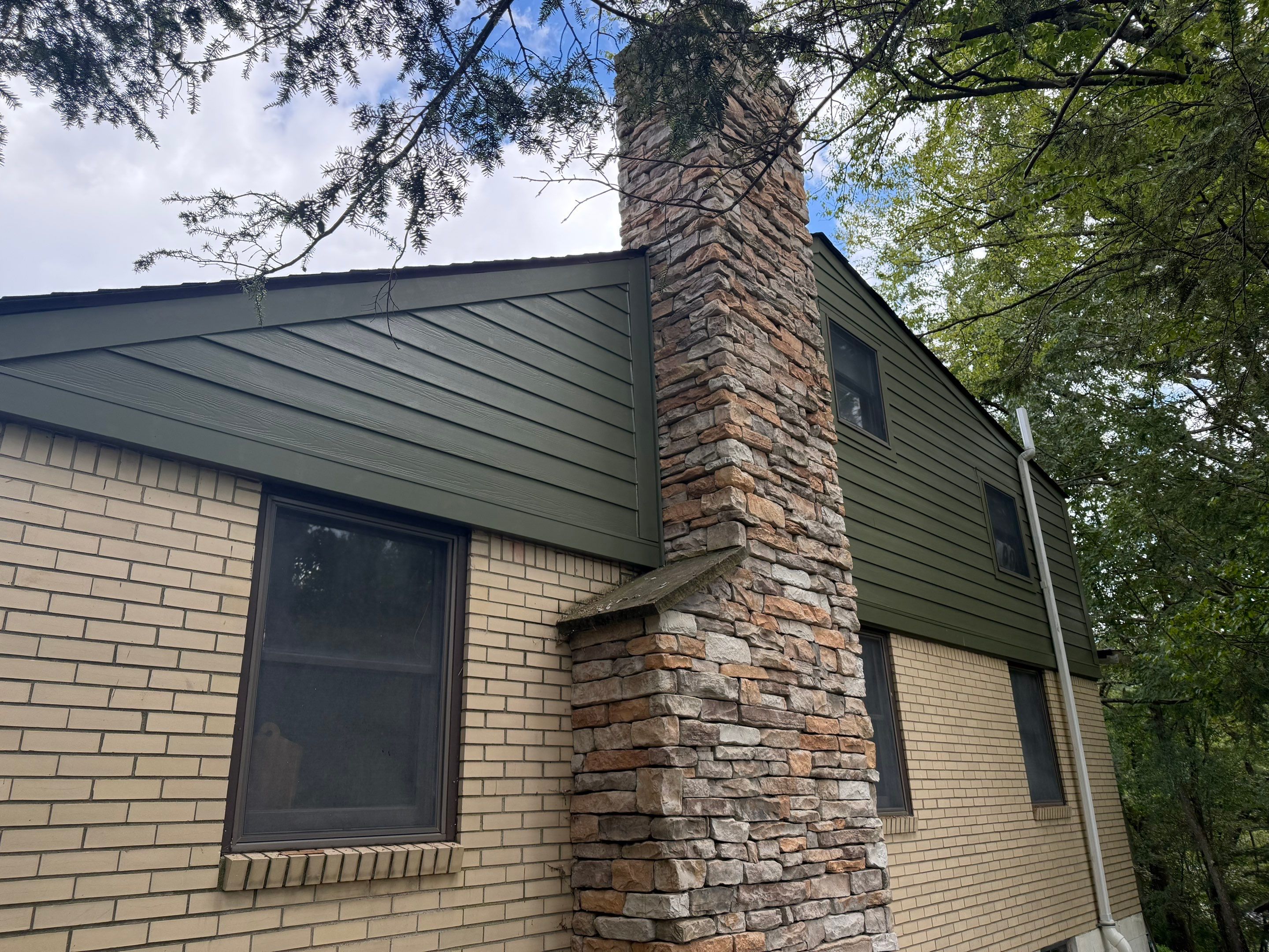 Hardie siding  by Cousins Roofing Siding & Decks