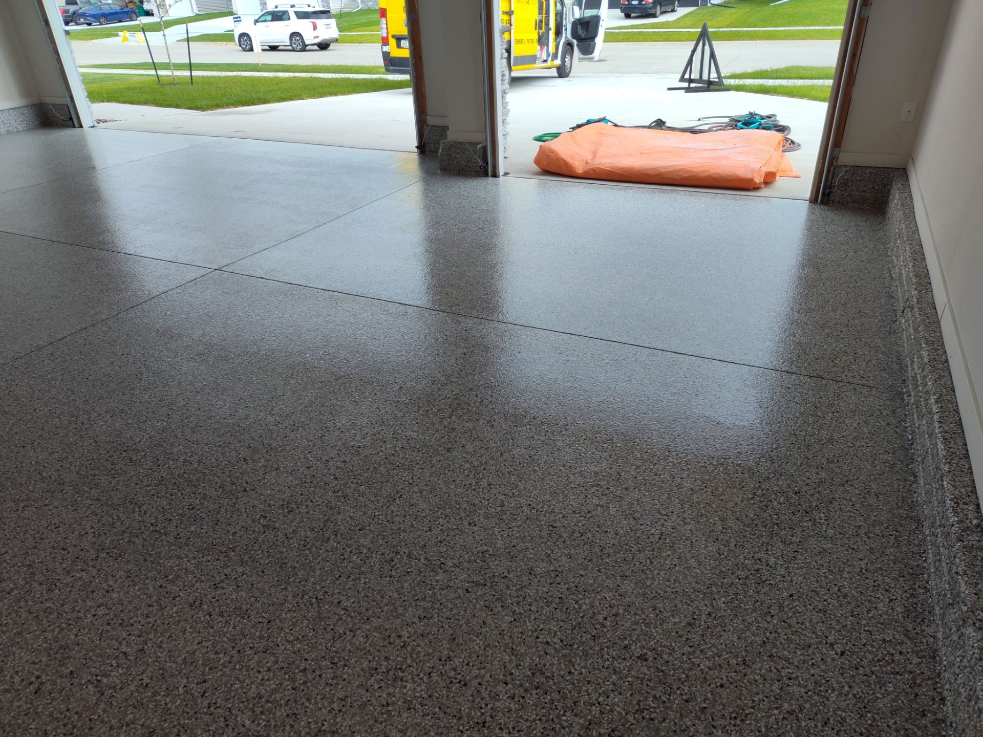New Bondurant Garage Floor Coating by Revival Concrete Coatings, LLC