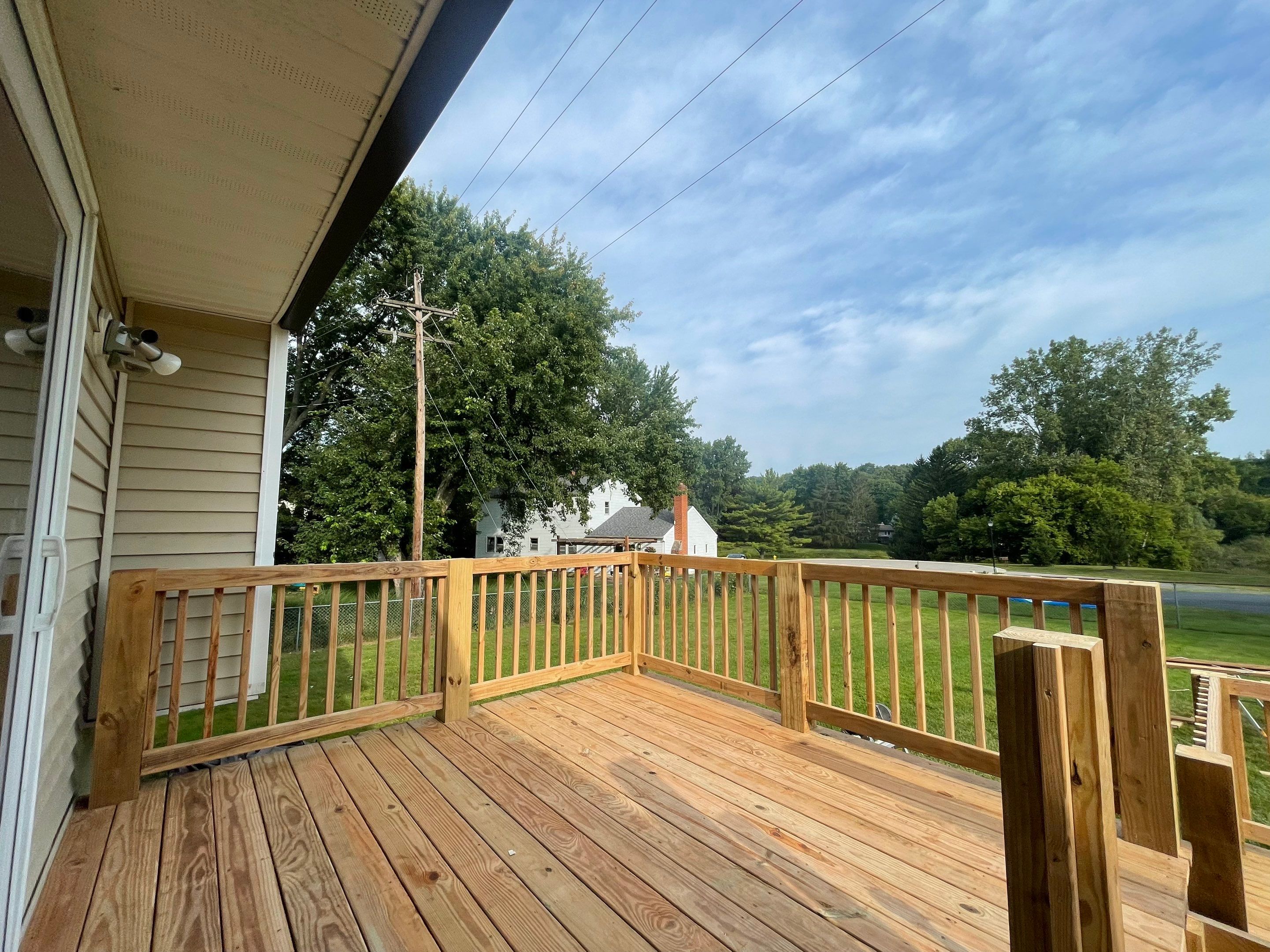 Deck Installation using Treated Lumber by Avalon Roofing and Exteriors