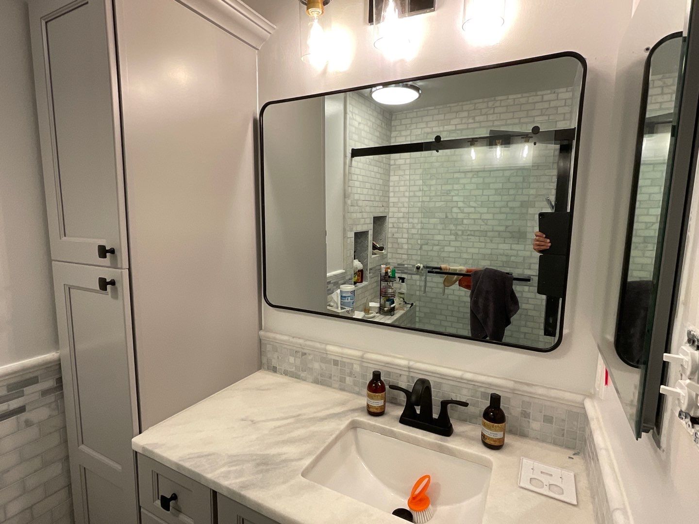 Bathroom Remodel using Two new bathroom design and new floors by Alpha Design Services