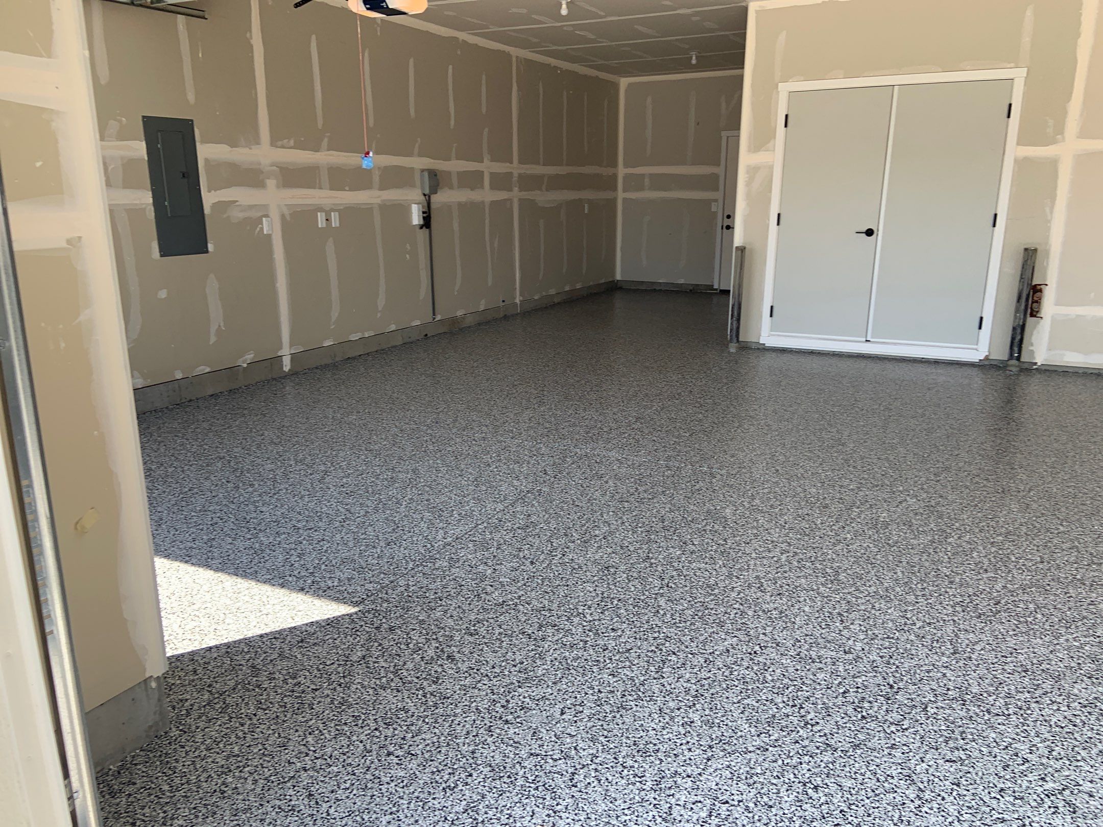 Garage Transformation using Domino by Croc Coatings, LLC