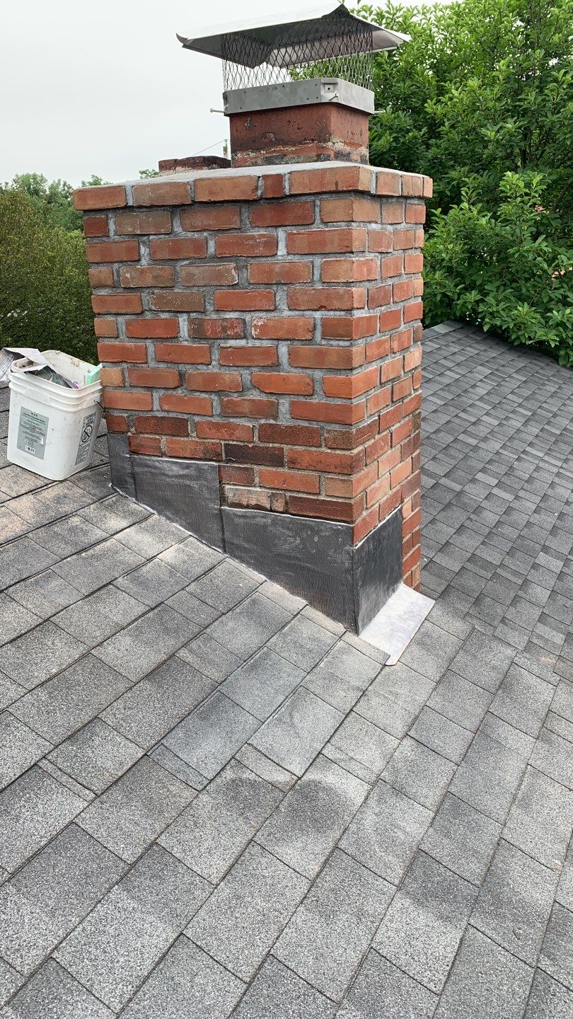 Residential Roofing Repair using Chimney Flashing by A Plus Exterior