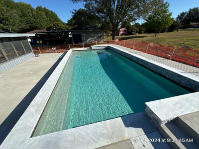 Large Modern Rectangular Pool with Tanning Ledge