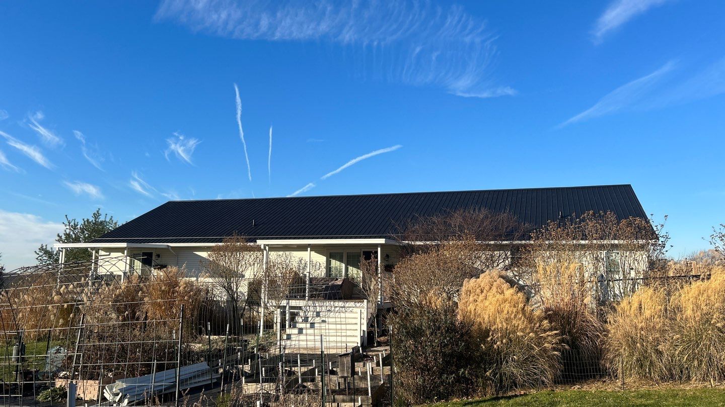 Residential Roofing Installation using Performance Panel Metal - Frost Black by RoofX 