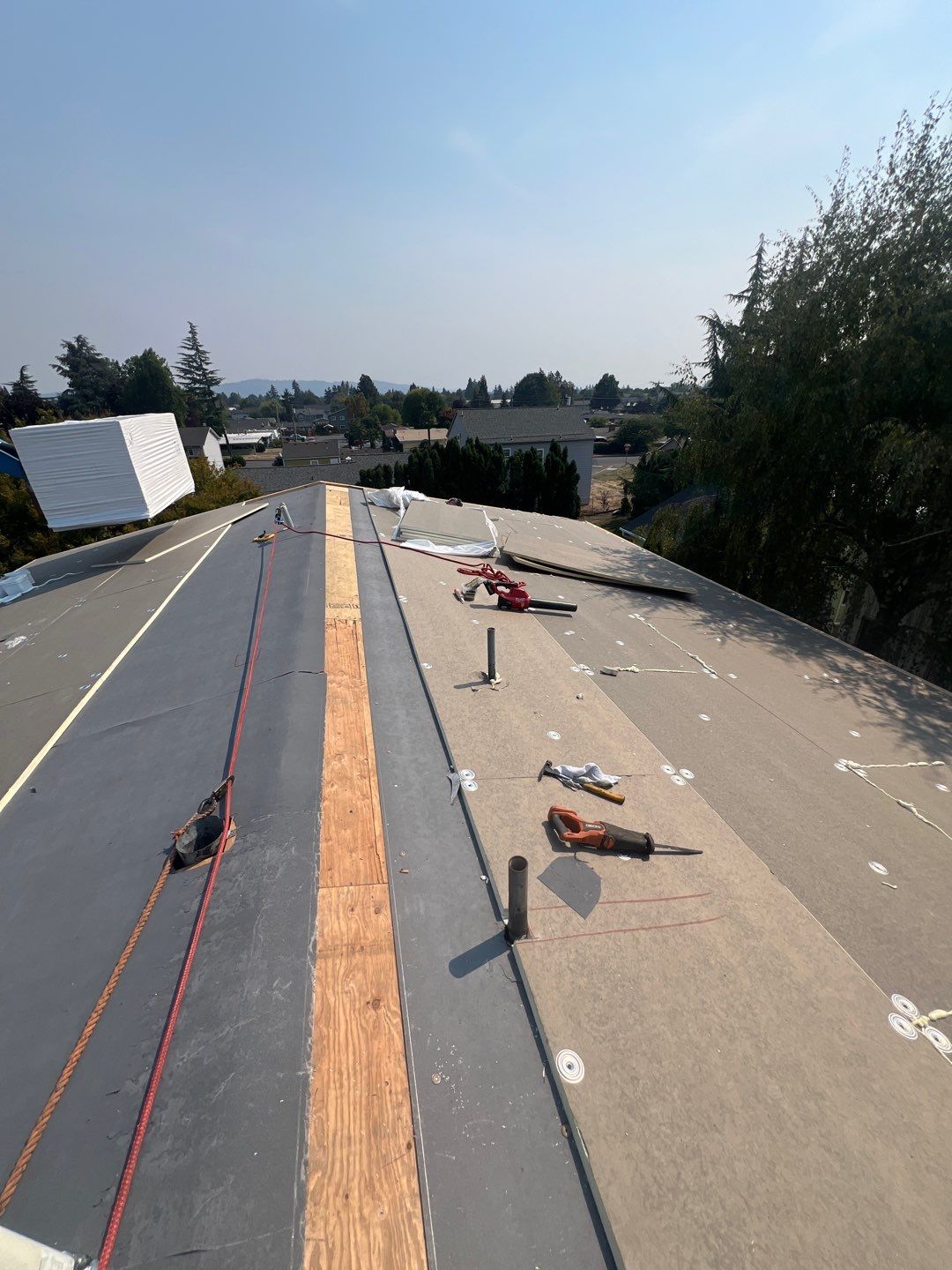 Commercial Flat Roof Installation using GAF 60Mil TPO  by Orezona Building & Roofing Company, Inc.