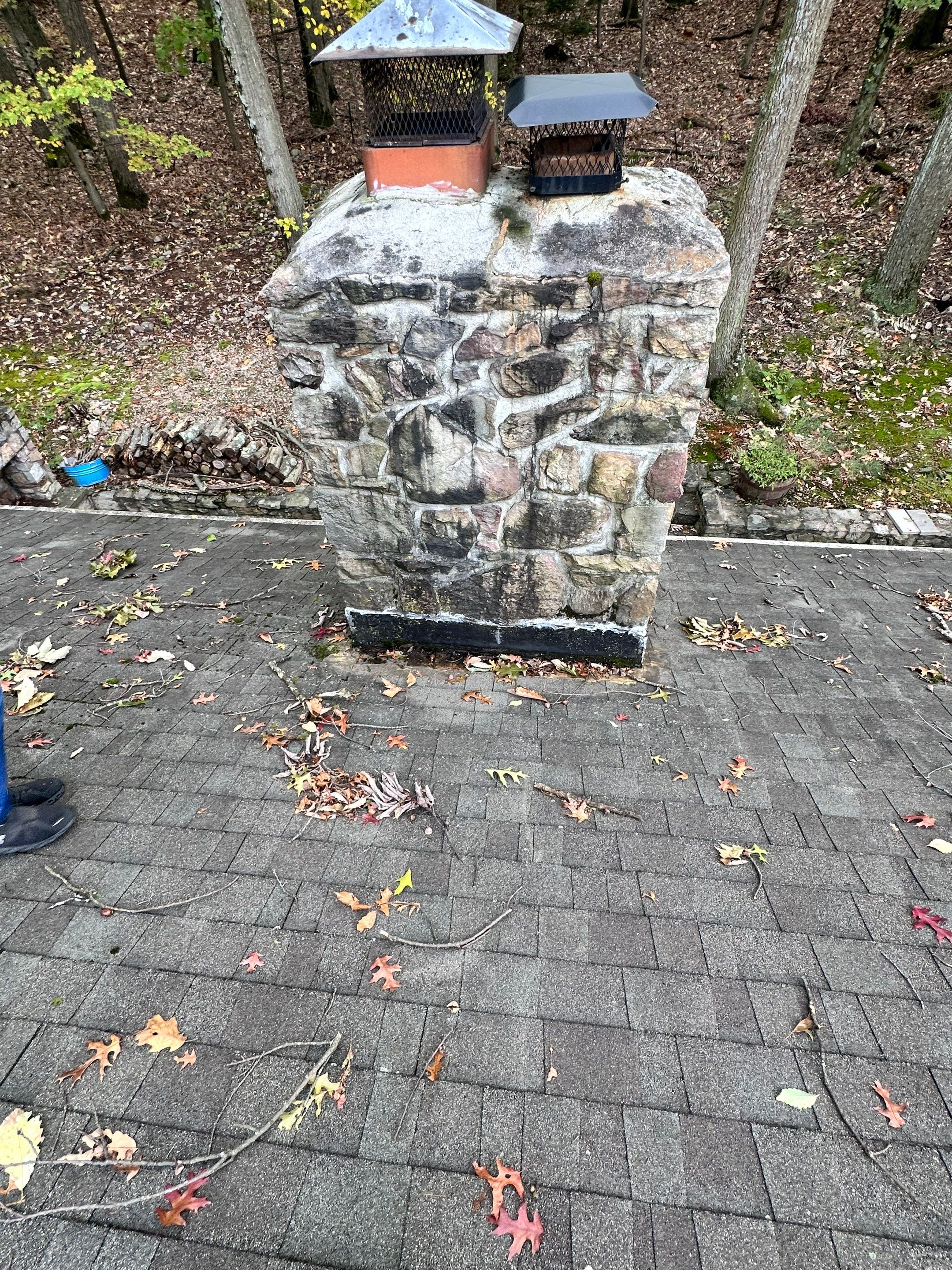 Insurance repair and chimney saddle installation. by Teflon Roofing