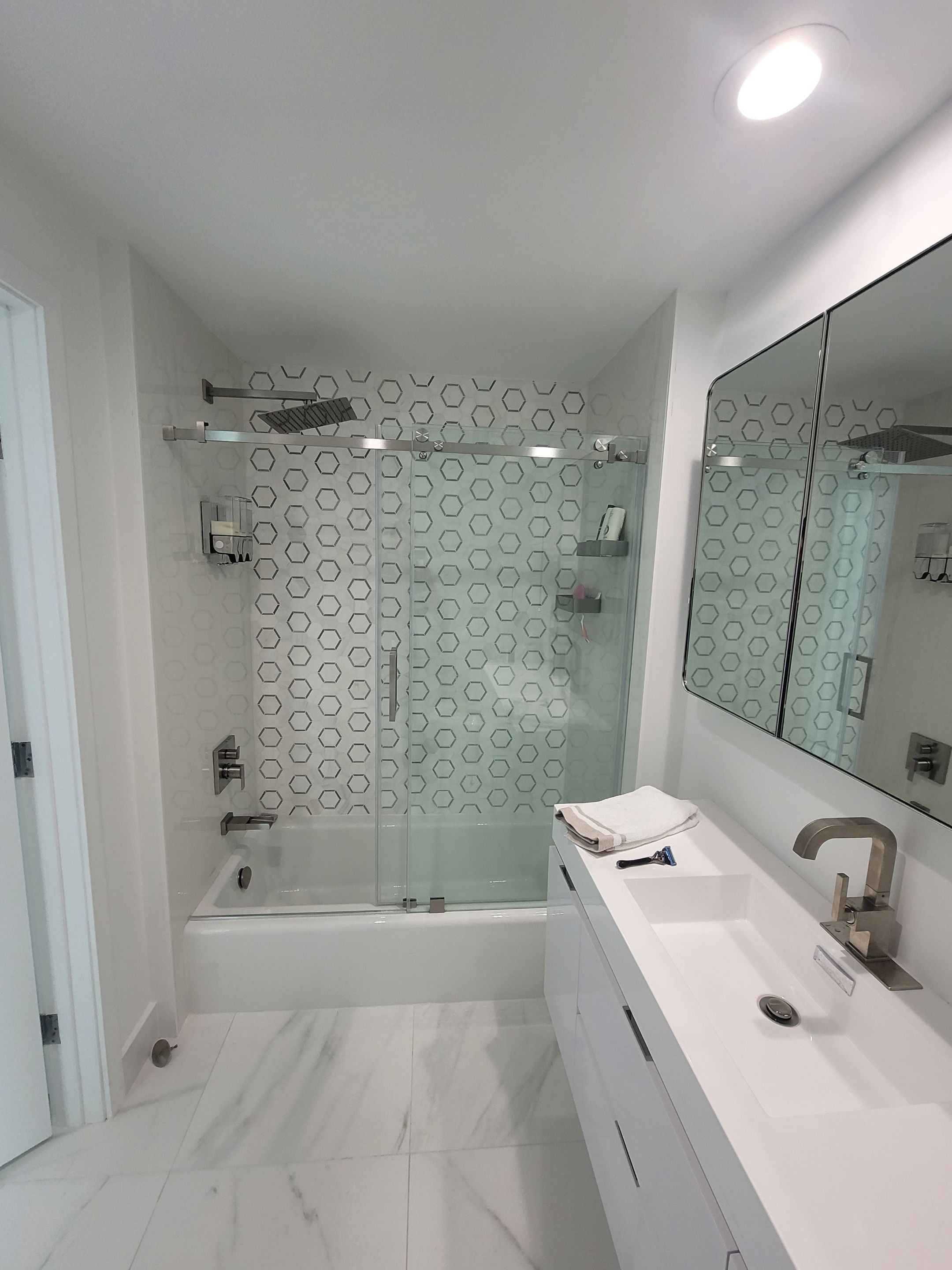 Modern High-Rise Interior Renovation and Custom Tile Installation in Miami by Picos Construction Engineering
