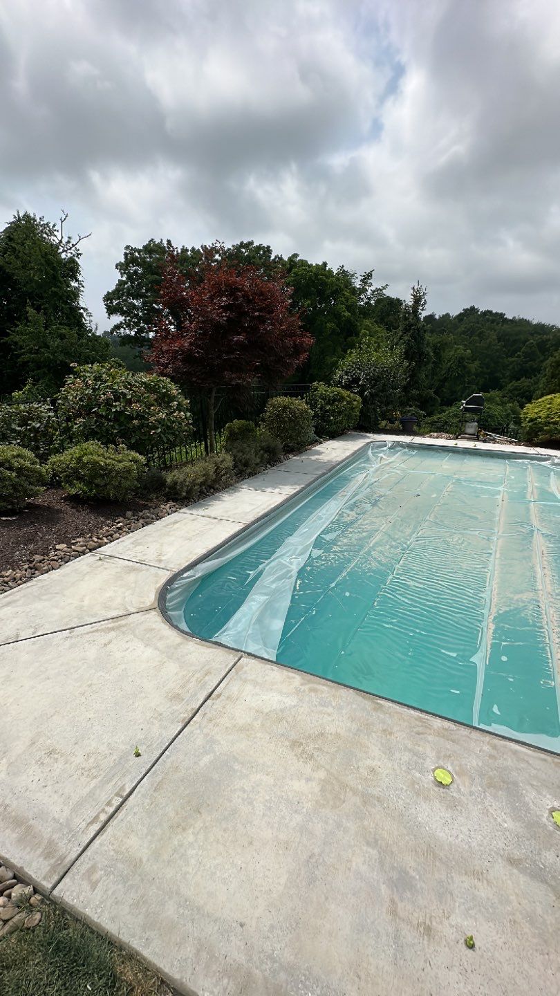Pool Deck + Driveway + Garage Project in Venetia by Floors in a Day, Inc
