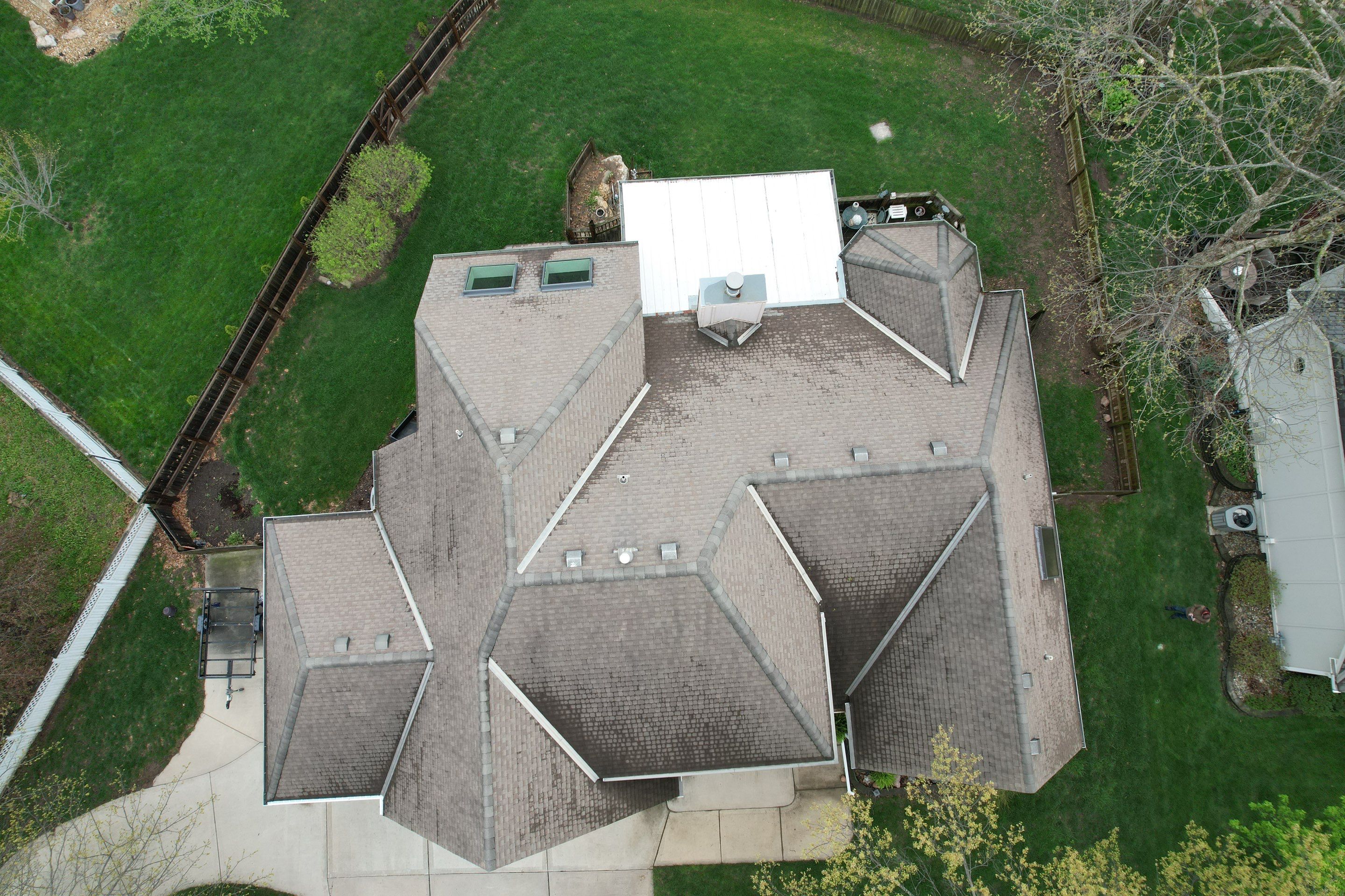 Comprehensive Roof Replacement and Skylight Installation in Kansas City by Liberty Roofing