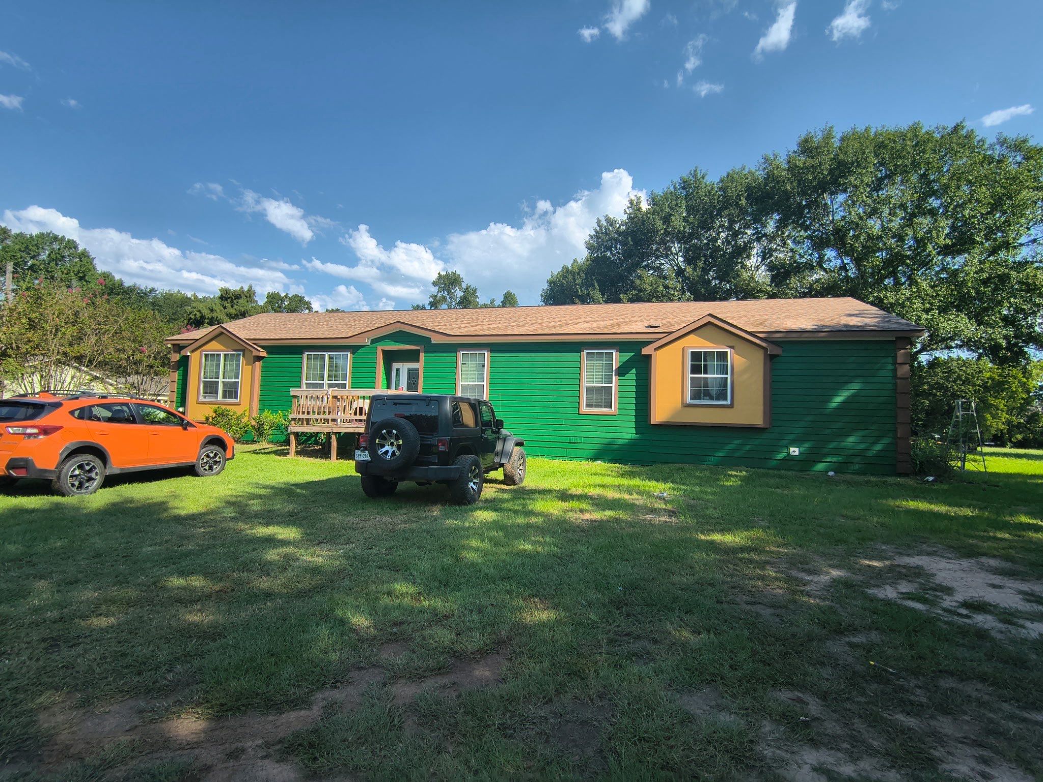 Exterior Painting in Lindale, TX | Bright Green Wood House Repaint by Quality Coats Painting