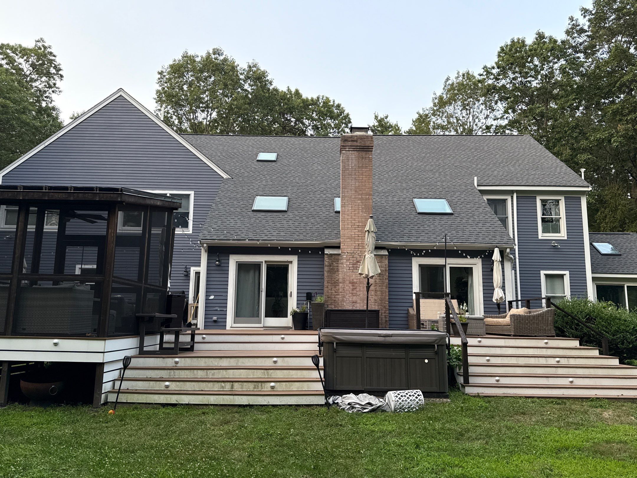Solar-Ready Roof Replacement with GAF Pewter Gray Shingles & VELUX Skylights by Sensible Home Solutions