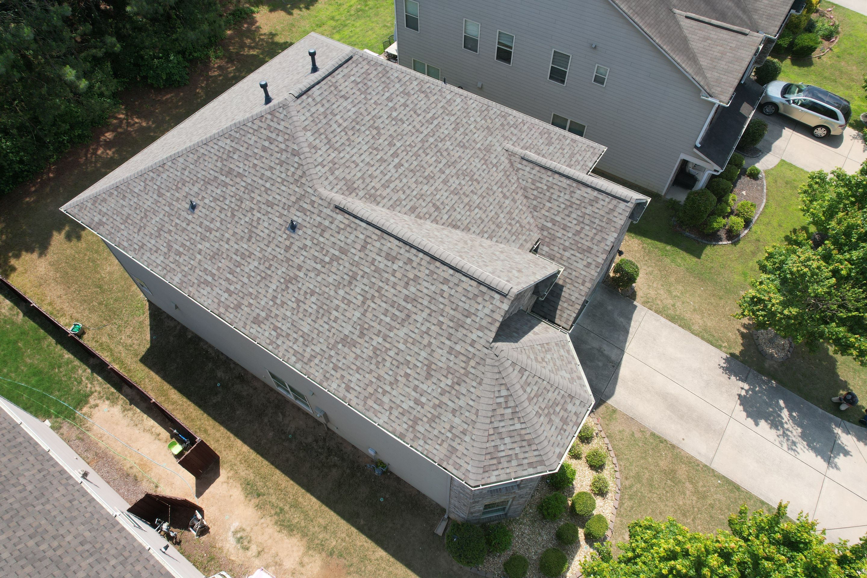 Residential Roof Replacement using Owens Corning TruDef Driftwood by Inspector Roofing and Restoration
