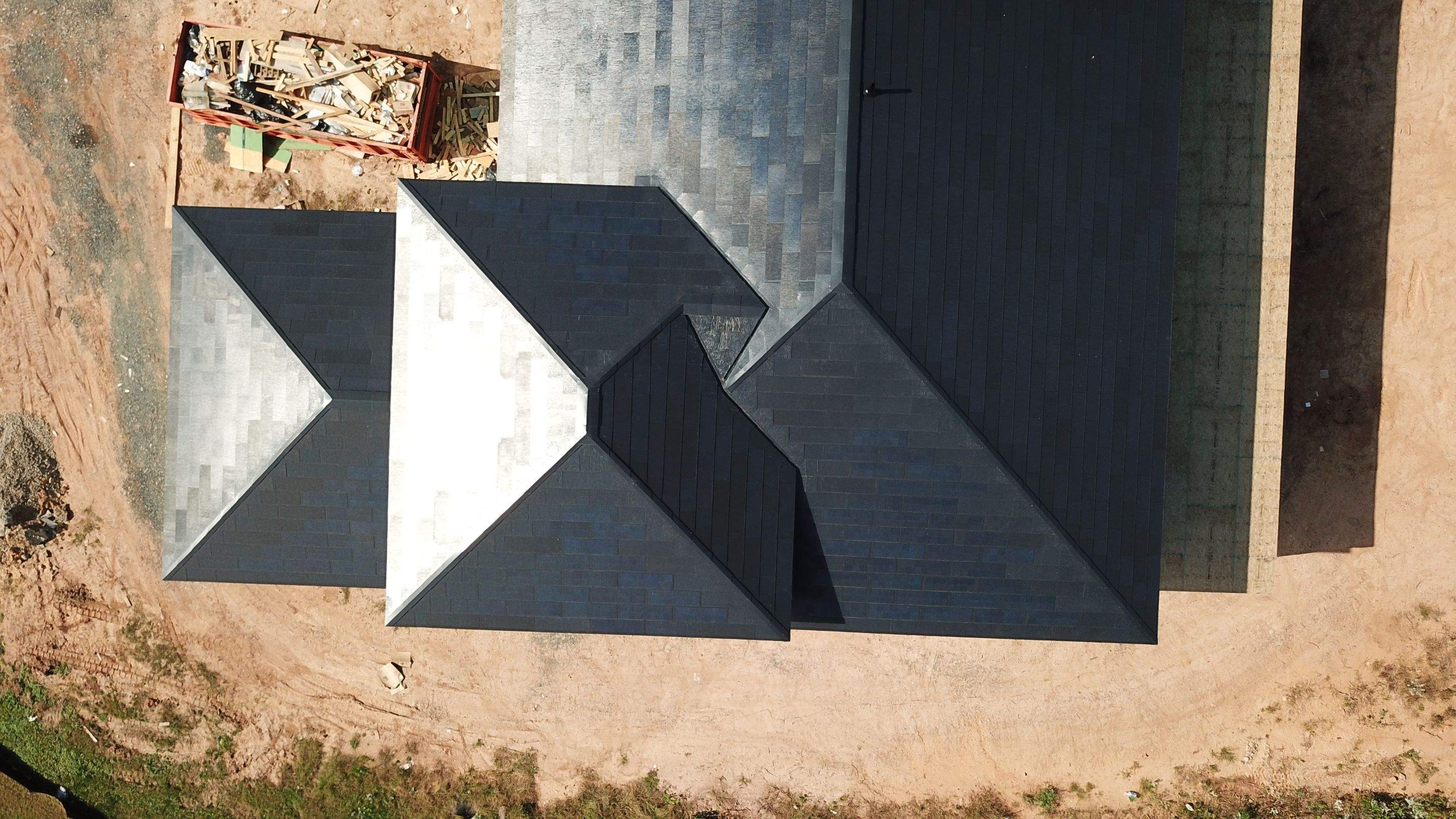 Tesla Solar Roof  using Tesla Solar Roof V3 tiles by American Home Contractors