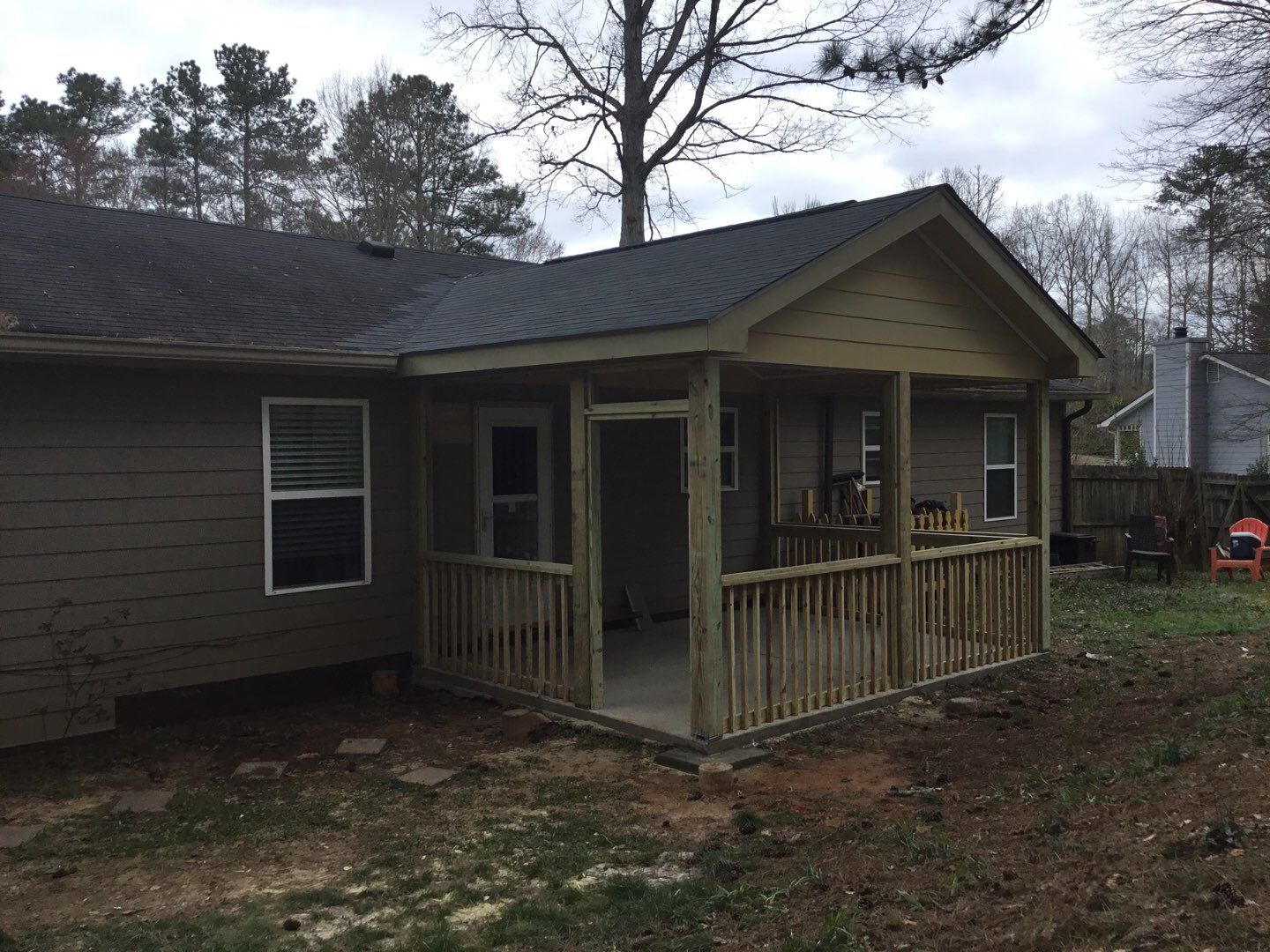 Screened Porch Construction with Vaulted Wood Ceiling in Douglasville by Swift Home Renovations