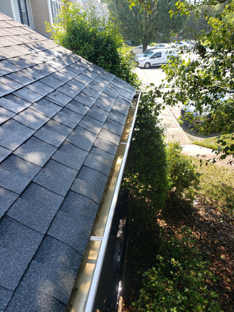 Gutter Cleaning using water by Power Wash Masters LLC