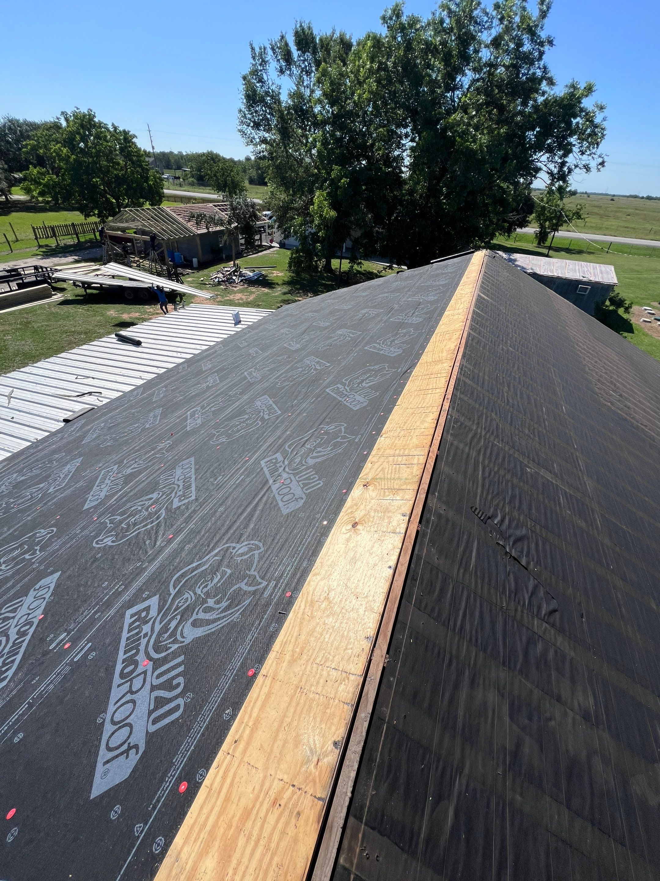 Residential Roofing Installation using Metal by Roof Repair Company