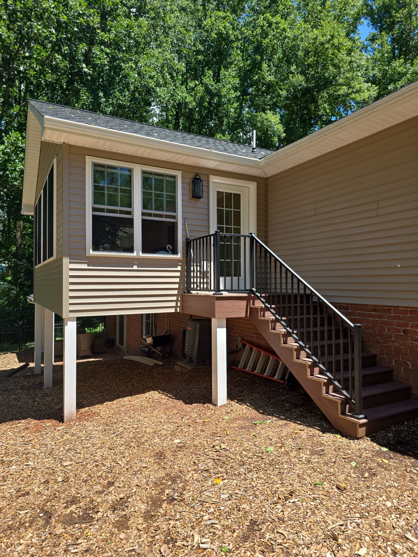 Sunroom addition and complete Exterior Remodel by Wyomissing Construction LLC