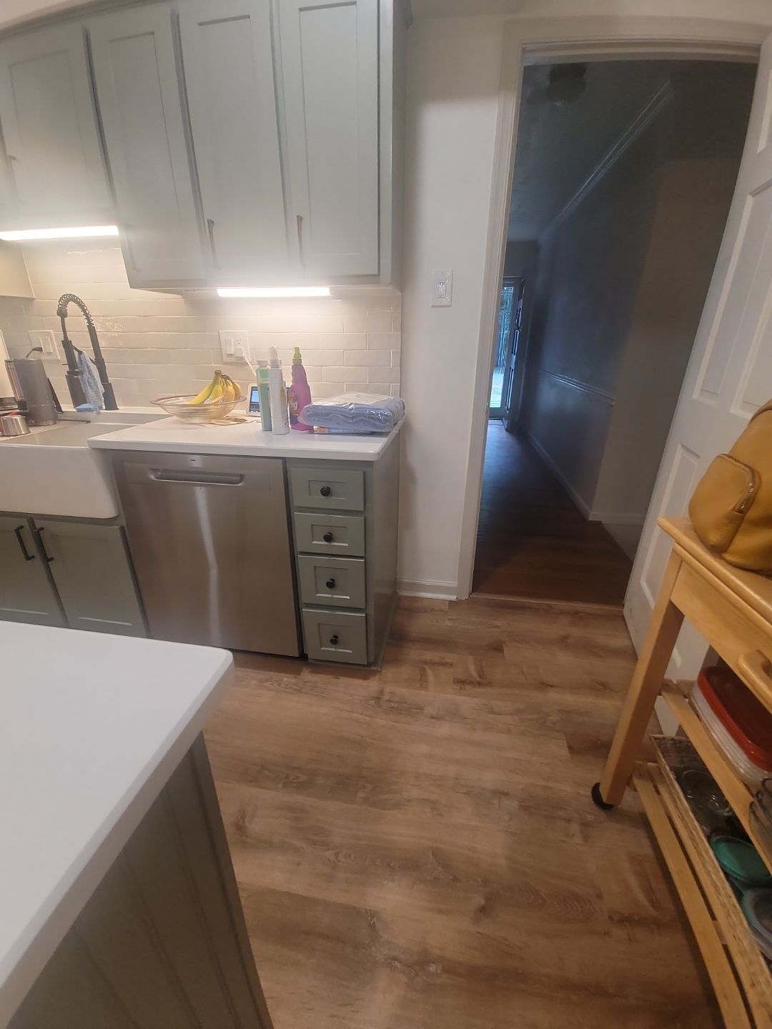 A Pathway to Personality – A Two-Tone Kitchen Transformation in Apex by Elite Remodeling and Design LLC