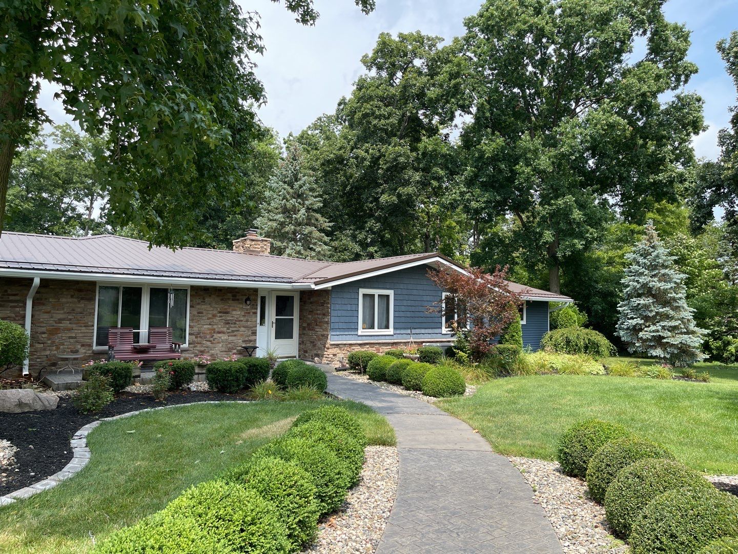 Residential Roofing Installation using Exposed Fastener Metal Roof by 4Ever Metal Roofing