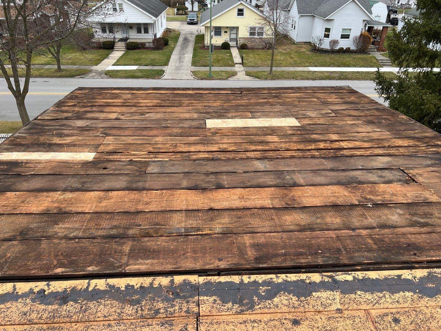 Residential Roofing Installation using 60 mil rubber roof by Nitro Roofing and Construction