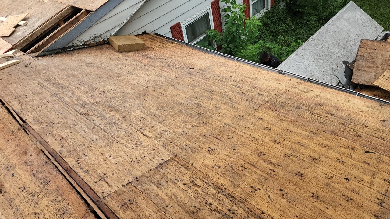 Residential Roofing Installation using 60 mil rubber roof  by Nitro Roofing and Construction