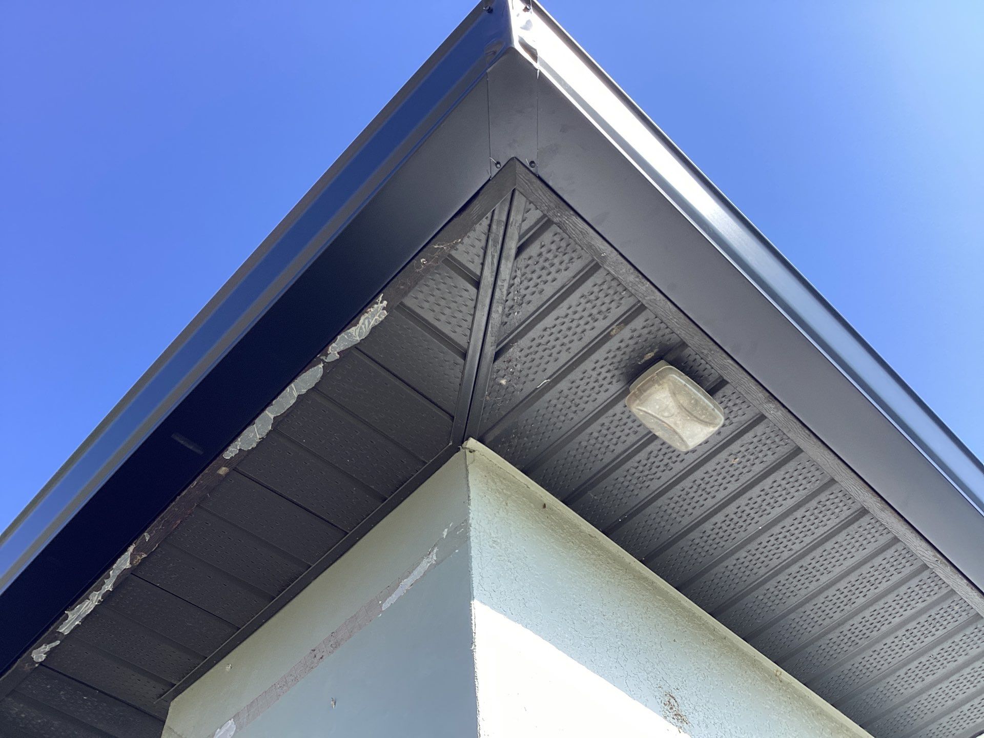 Black Seamless Gutters using 6 Inch Seamless Gutters in Cape Coral FL by Gutter Professors