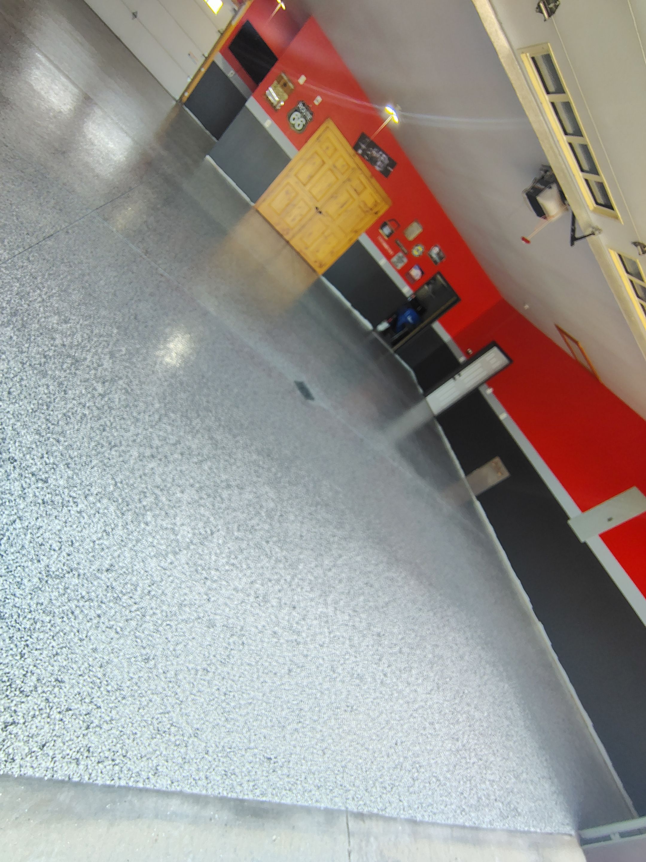 Multi-Car Garage Concrete Coating and Floor Refinishing in Hull by Select Painting, Coatings & Garage Cabinets