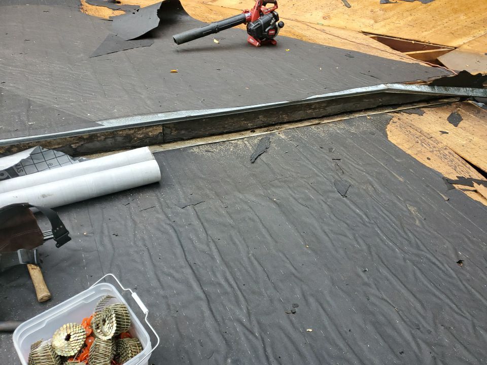 Residential Roofing Installation using Roof Replacement by American Roofing & Construction LLC