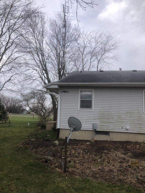 Storm damage roof replacement by Nitro Roofing and Construction