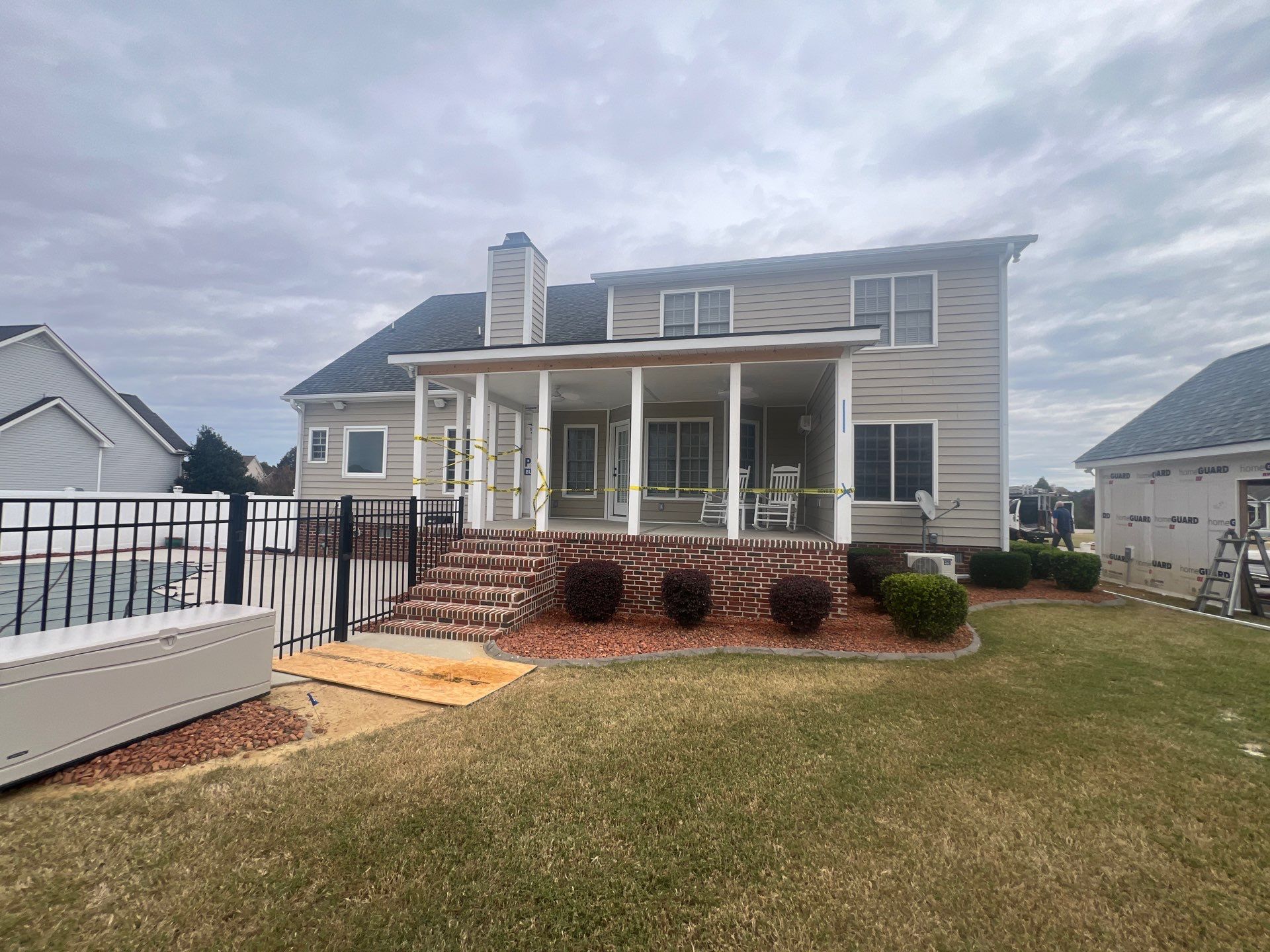 Custom Screened Porch and Concrete Walkway Installation in Rocky Mount by The Remodeling Company
