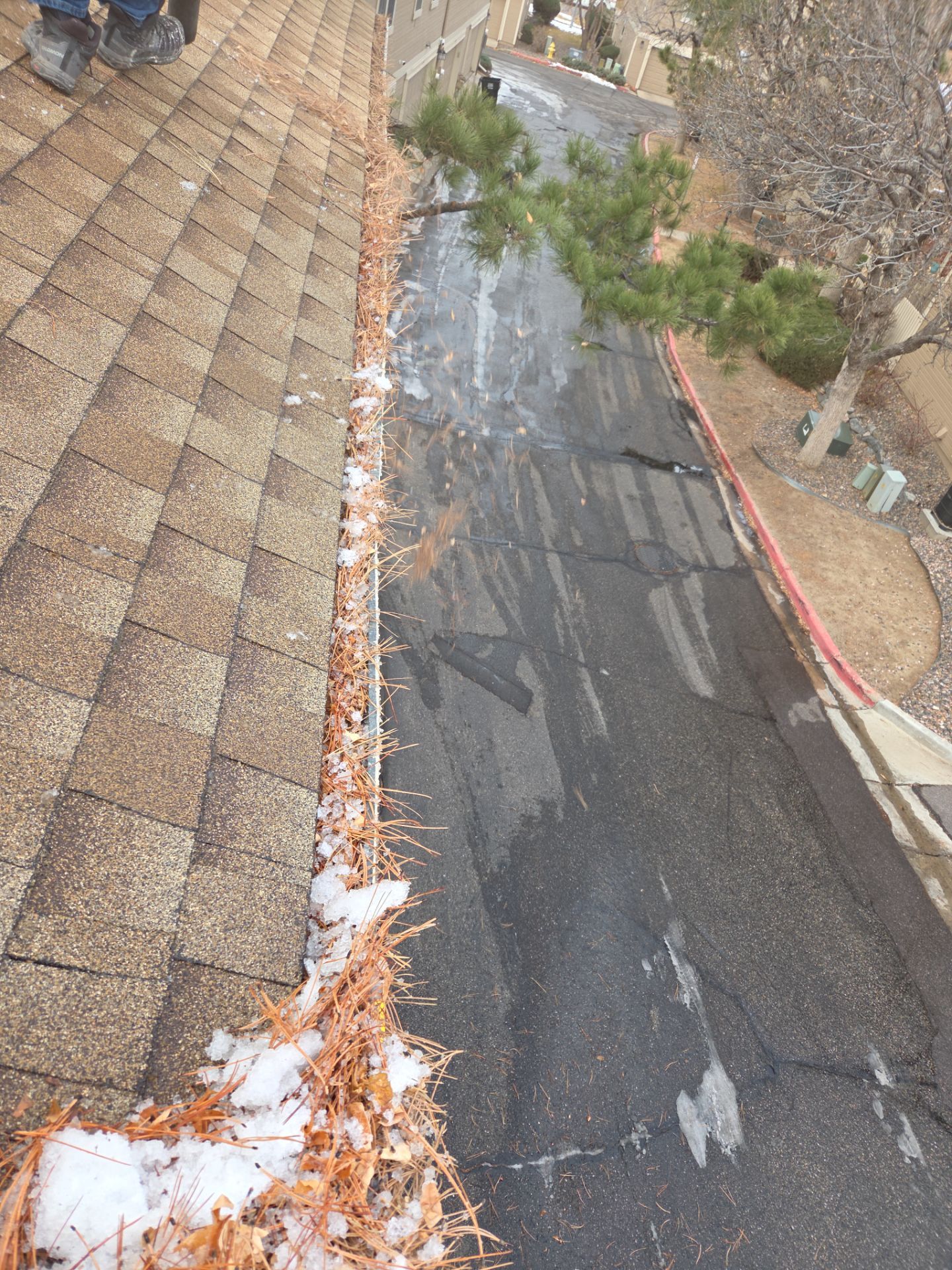 Gutter and Downspout Cleaning by RTP Roofing Company