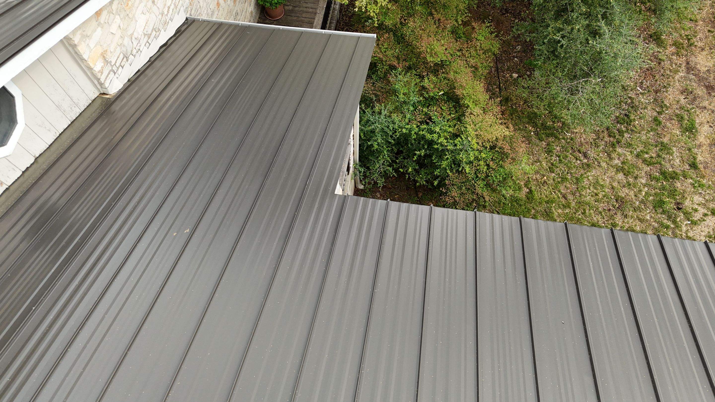 Dark Bronze - L&A Standing Seam with Striations by RoofsOnly.com